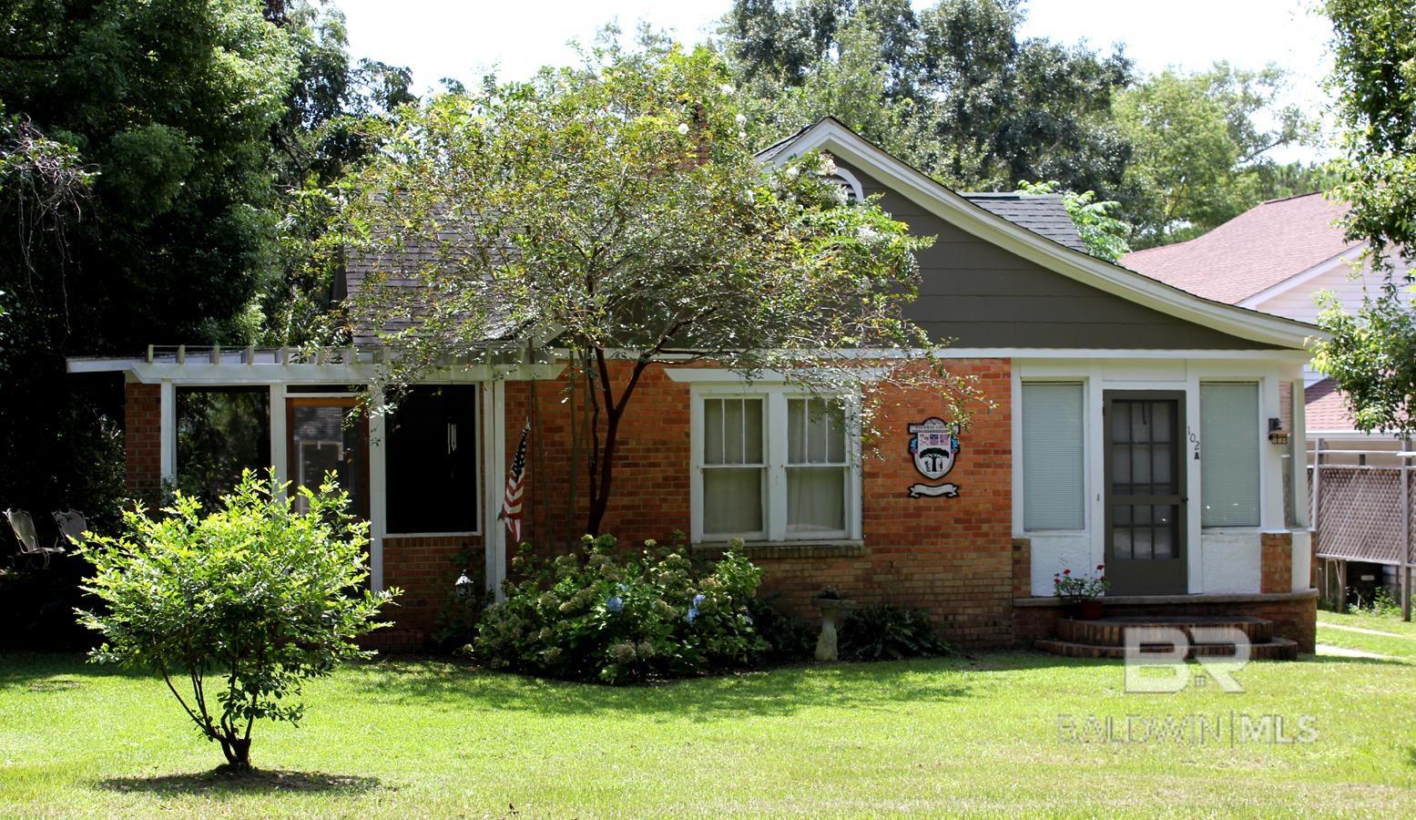 A unique find in Fairhope's popular Fruit and Nut neighborhood. Built in 1940, the Clay City Tile main house is 868 square feet, 2 bedroom, 1 bath.   The 432 square foot guest cottage is a 1/1.  Room dimensions are based on bedroom 1 and 2 in the main house, bedroom 3 and great room are in the guest cottage.