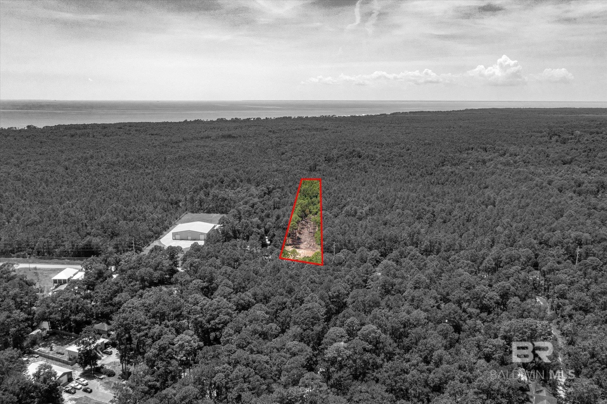 This property has been partially cleared, has water & electricity connected, and is ready for your dream home, 112 feet of paved road frontage on Mary Ann Beach Rd.  Just a few miles away from a public boat launch!