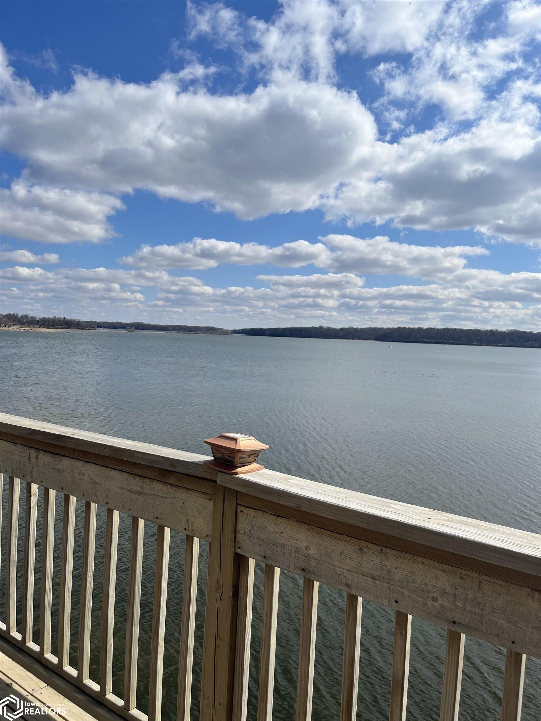 Breath taking view from this penthouse condo. Quiet and peaceful is what you will get.  Watch the boats and birds while having your coffee. This unit comes with the option to enjoy 2 boat slips and lake life.  All kitchen appliances and washer/dryer stay.  Some personal items are included also.