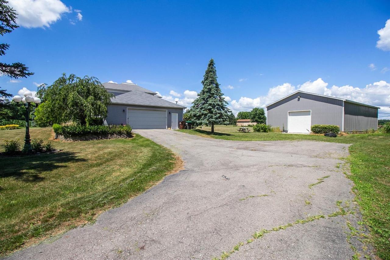 668 MOOREVILLE RD, MILAN, MI 48160