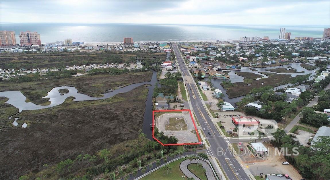Over an acre with 300' road frontage directly on Hwy 59 in the heart of Gulf Shores! Located immediately South of Waterville USA and across from Hardees- prime development location! Just a little over half a mile from the beach. High traffic count- GREAT visibility on Hwy 59. Listing includes PPIN#'s 048569 and 000698.