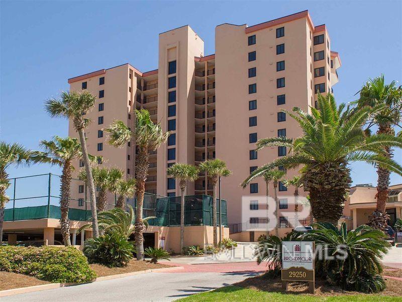 Immaculate, spacious 2 bedroom, 2 full bath Gulf-front condo in desirable Broadmoor in Orange Beach!  Beautifully furnished and accessorized, unit has stunning views from the living, dining, & kitchen areas as well as the spacious primary bedroom. The floorplan is packed with all the extra touches which make a beach condo feel more like home: a separate hallway off the living room which leads to the bedrooms; bedrooms are at opposite ends of the unit for maximum privacy. Full bath is accessible from the hallway, and the laundry closet is tucked into the hallway for easy access.  Broadmoor is known for its extra large master bedroom suites - a rare design feature in Gulf front condos.  The primary bedroom features a large walk-in closet (almost as big as some bunk rooms!), private bath with granite double vanity, separate shower & luxurious jacuzzi tub, and a separate sitting area with balcony access. The sitting area is large enough to add a small convertible sleeper sofa or chaise, if desired.  The second bedroom has two full/queen beds.  A small hallway separates the bedroom area from the living room, so noise is at a minimum. Living room is a combo living /dining, tastefully furnished.  Dining table seats four.  The fully equipped kitchen overlooks the dining room, so you can enjoy casual dining at the granite topped bar, and the cook never misses any of the fun! A wet bar and beverage cooler make entertaining a breeze. Best of all - step out onto the balcony of this unique property and enjoy totally unobstructed Eastern views! The Broadmoor is a classic; they truly don't build them like this any more. Outdoor pool/hot tub, full fitness center, covered parking, onsite manager and beach level storage round out the amenities. On the coveted East side of Orange Beach that stretches from the Perdido Pass bridge to the Florida line, the Alabama portion of the "Key" has lower density buildings with larger footprints. Less crowded beaches AND easy walk to FloraBama!