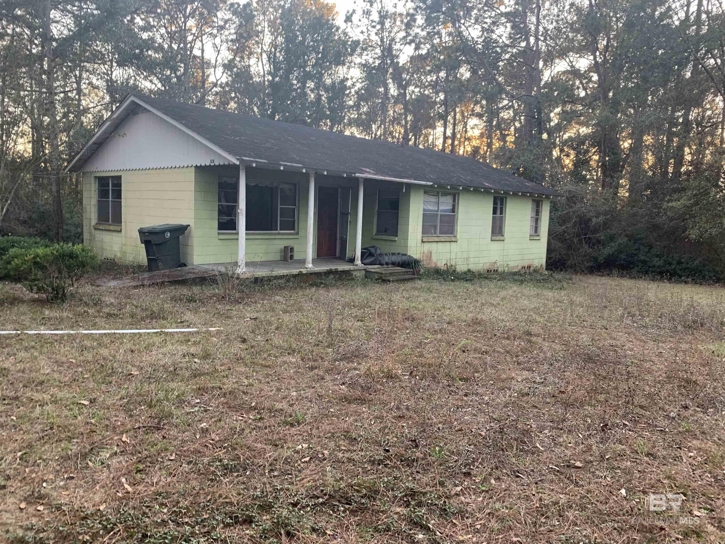 CALLING ALL INVESTORS. 3/1 Cinder Block home that needs to be gutted sitting on 3.30 acres on private drive in Lake Forest. NO HOA DUES. HOME BEING SOLD AS IS/WHERE IS!!  128 Rays Lane is address to use for GPS.