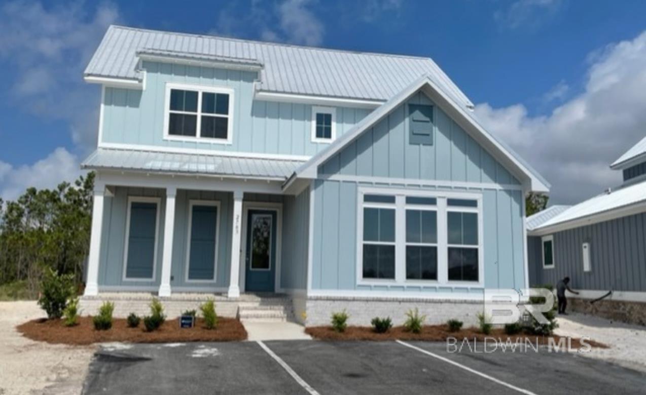 Welcome to Summer Salt, Truland Homes' newest upscale community in Orange Beach, AL. Drive into the lake and nature filled neighborhood and immediately feel your blood pressure drop. Beauty in abundance! Enjoy the zero entry resort style pool and entertaining cabana on site or take a 1/4 mile stroll to beach access. Relax by the community fire pit, try your skills on the putting green, or just sit back and enjoy the bird fest flyovers. Lots of local restaurants and entertainment within walking distance. This 3 bedroom, 3.5 bath coastal designed home has 2005 square feet of beach style luxury living space. Upgraded cabinets, granite, flooring, plumbing fixtures and tile. The kitchen features Calacatta Vicenza granite, an apron front sink and a 5 burner gas range. Highly desired EVP flooring in all main living areas and master bedroom. Parking galore with three assigned spaces and ample guest spots as well!  Built to Fortified Gold standards. Enjoy the total connected home package which includes a Ring doorbell with a Zmodo outdoor camera, Android tablet, Smart Home Hub, programmable Ecobee 4 thermostat, Connect 2 wave deadbolt on front entry and a Connected Home 4 hour training session. Rental projections from $70,000-$80,000. Estimated completion date is June- July 2022.
