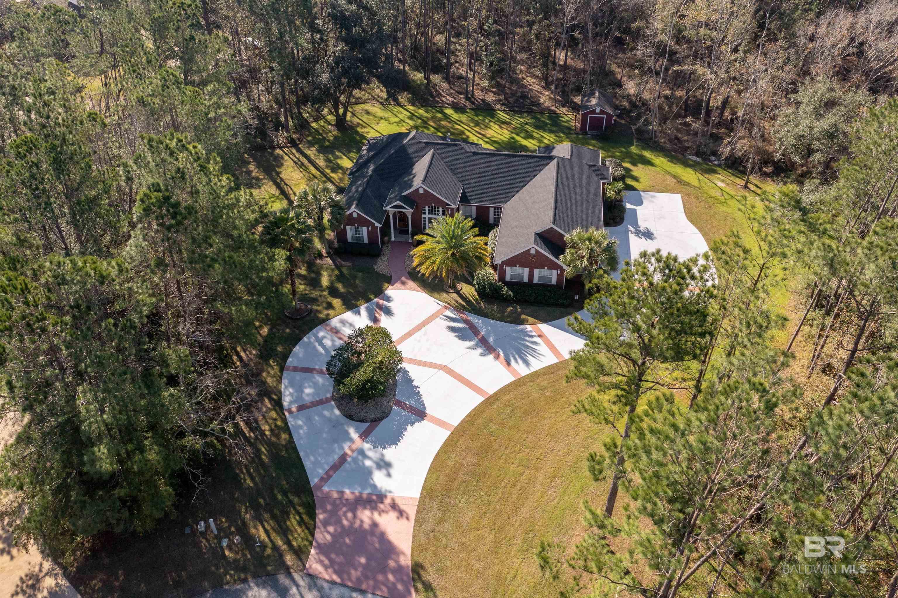 Looking for that peaceful place? Then come over to 18132 Treasure Oaks Ct. This home sits at the end of a cul de sac on approximately 1.5 acres. As you pull in you will notice the circular drive along with the drive leading down the side of the house to the triple car garage. The garages are heated and cooled with their own central unit. As you walk into the home you will see the large family room featuring hardwood floors and a gas fireplace. Over in the kitchen you have a ton of storage space along with lots of granite counters. All the stain steel appliances remain including the side-by-side refrigerator and wine cooler. Notice the workspace that is built in by the breakfast area. You will find lots and lots of storage space throughout the home. All four bedrooms have large walk-in closets along with closets down the hallway. You also have an office on the side of the house with two of the bedrooms. Large master bedroom and the master bath has separate shower and jetted tub. Step out back to enjoy the peace and quite while drinking your morning cup of coffee in your screened in patio. Out back you have a 12 x 18 storage building that is wired for power, but line has not been run to the building. The home has a new fortified roof, new grinder pump, new hot water heater all installed in 2021 along with all new carpet in the bedrooms and office as per the seller. The irrigation system operates off its own well water. There are 3 HVAC units, two for the house and one for the garages. The fireplace operates off propane and the connections are out on the patio. There is deeded access to a pier across the street from the entrance to subdivision that is great for watching sunsets. Central Vac System not working and not warranted by the seller.   All information provided is deemed reliable but not guaranteed. Buyer or buyer’s agent to verify all information.