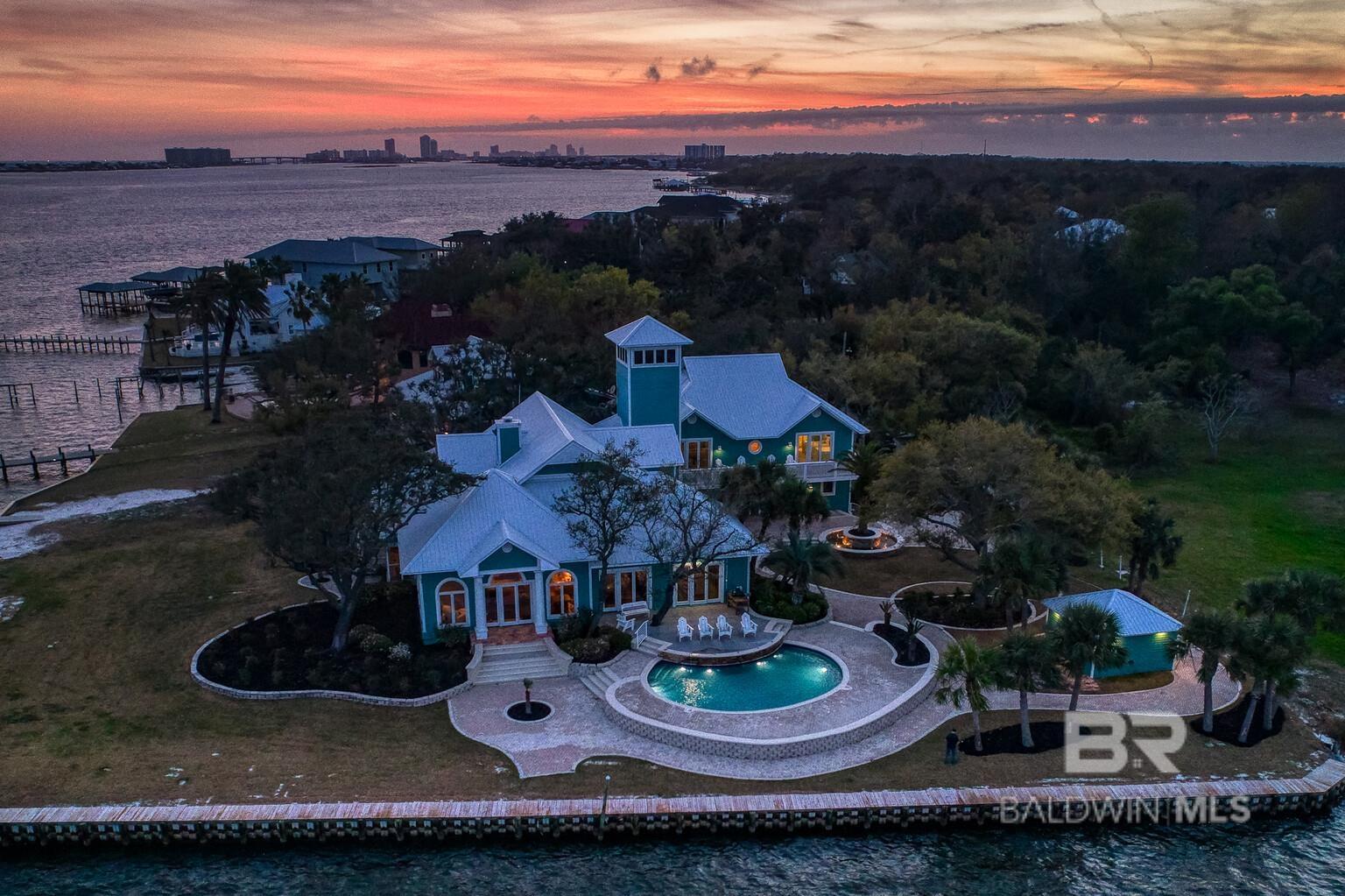 Imagine tranquil sunsets, an abundance of water activities and making memories with friends and family in this sprawling estate home. This sophisticated 8,850 sq ft home invites you as you step into the foyer surrounded by reclaimed wood. A massive kitchen with upgraded appliances perfect for entertaining and surrounded with windows overlooking stunning views. 230 feet of lush landscaping of waterfront property on Bayou St John. The home features 7 BR and 8.5 baths. Mother in law suite and separate apartment with exterior entry.