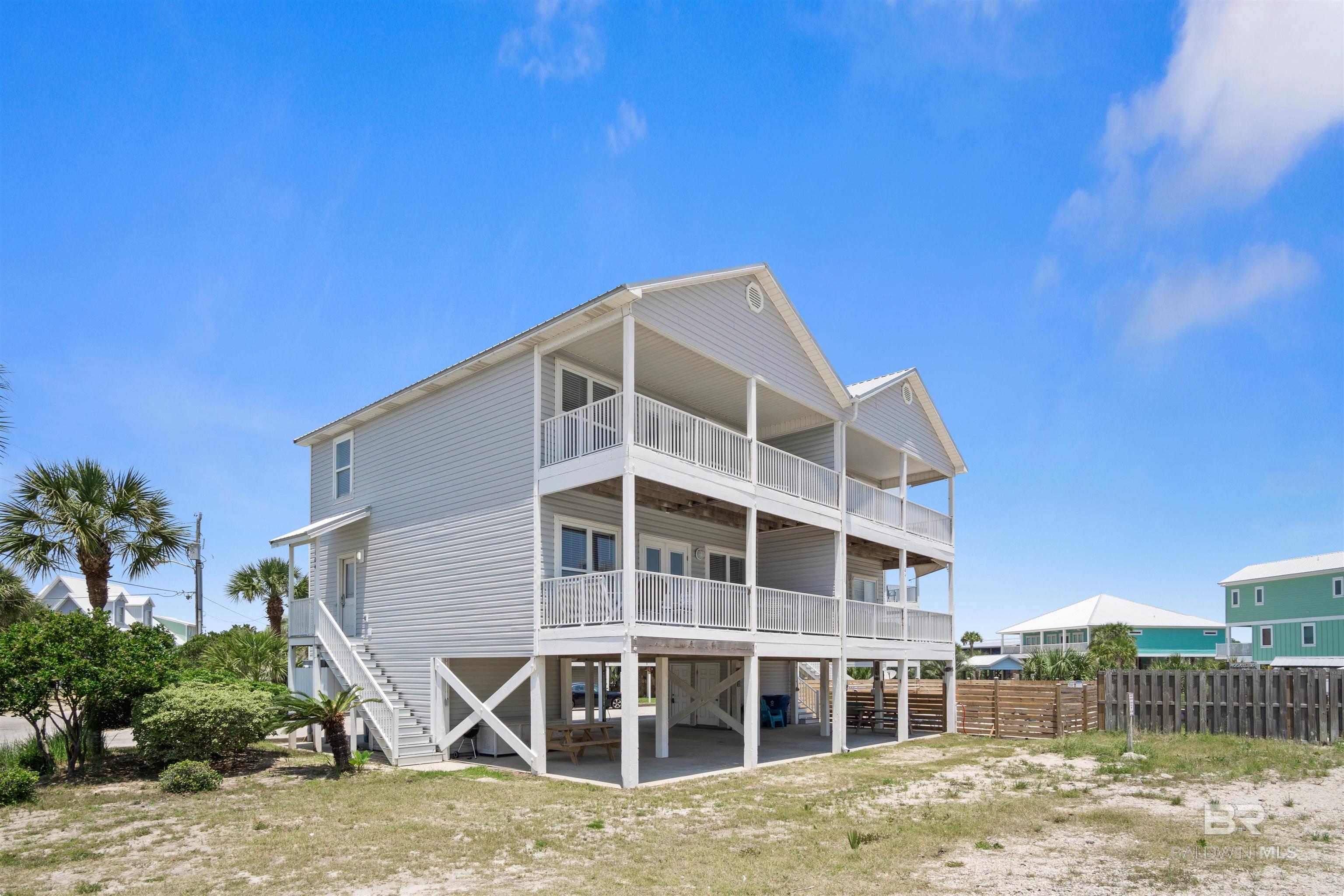 This rare complex on West Beach doesn’t come on the market often! Located on Little Lagoon, this low density condo includes private water access. Bring your kayak, jet skis, and fishing rods! This unit is perfect for those that enjoy the beach but also like to play in lake. It is one of three in the whole complex, which makes it very appealing if you don’t like crowds and want full access to all the amenities!  It has been beautifully renovated in the last 2 years. Some of the renovations include granite countertops in the kitchen, new kitchen appliances and LVP flooring in the main living areas. There is a private outdoor pool for you and your guests. The beach is directly across the street and you can enjoy beach views from both of your outdoor balconies! Pier 33 grocery store and West Beach Coffee House are right next door. There is also easy access to all restaurants and entertainment in the heart of Gulf Shores! Do not miss out on this fantastic passive income opportunity! Showings will be limited due to the pre-booked short term rentals, however there is a full video tour ready to impress and prepare you for all it has to offer!