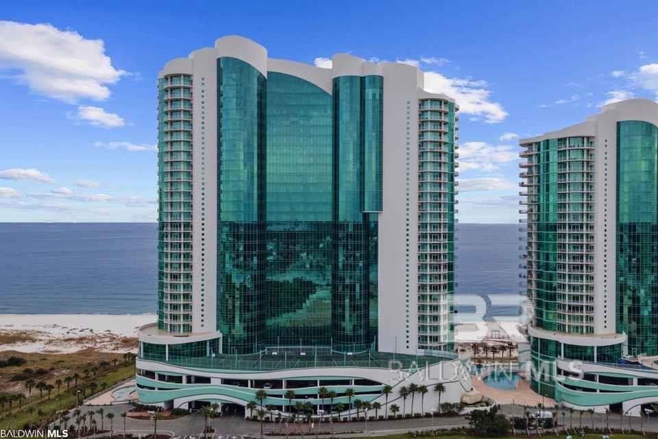 Enjoy amazing views from the 14th floor in this beautiful unit located at Turquoise Place in Orange Beach. This 3 BR/3.5 BA unit has tile flooring throughout with LVP in bedrooms, Subzero/Wolf appliances, wet-bar and granite countertops. Enjoy entertaining on the balcony with your own gas grill and hot tub! The spacious master suite has private access to the balcony, double vanities, tile shower, oversized jacuzzi tub, tv and a walk-in closet with a built in owner's closet.  Turquoise Place offers a reserved parking space for each unit, a seasonal bar and grill, poolside shop, onsite management and 24/7 security, saltwater indoor/outdoor swimming pools, hot tubs, lazy river, outdoor playground, sauna and steam rooms, tennis courts, and a fitness center overlooking the Gulf of Mexico