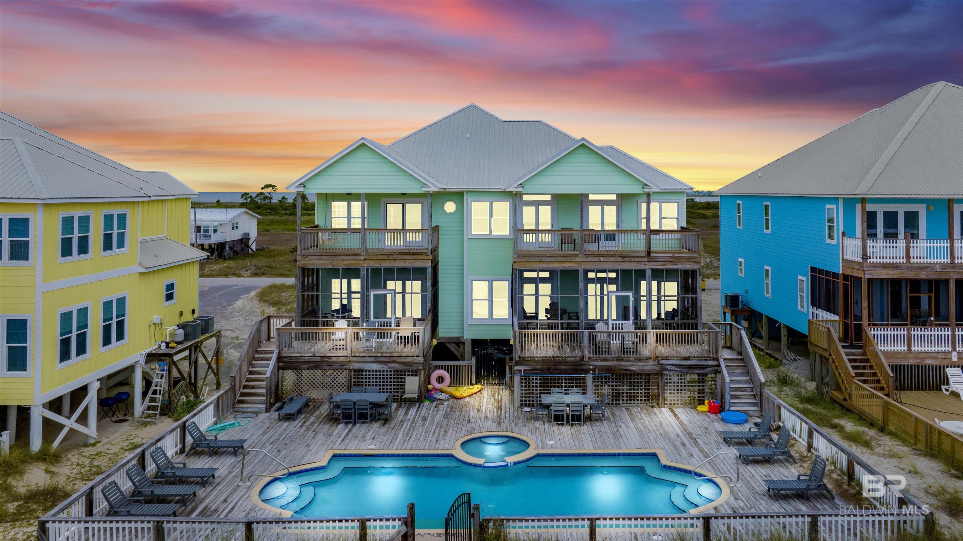 If you are looking for a vacation home for large families or if you're looking for an investment property, look no further than Beachside on Fort Morgan. Beachside is a large 11 bedroom, 7 bath house that is over 7,000 SF, has a private pool, and sits directly on the white sandy beaches overlooking the crystal blue water of the Gulf of Mexico. This is a Condo'd duplex that is offered as a single property.  MLS only allows one PPIN per listing.  This listing includes PPIN 237241 and 237242.  Owners have options to do what they wish. Rented separately or as one, sell a side, etc.  Rentals for 2022 exceeded 300K.  Take away the owner stays and gifts to family, pushing $400,000 in gross rental revenue. This home sleeps up to 40 so please allow time for showing requests and it is best to show between turn arounds during Summer (Saturdays, between 10 am and 4 pm). All information, measurements, details, etc. are to be deemed reliable and to be verified by buyers' and/or buyers' agents.