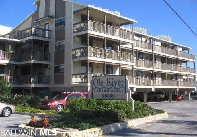 Welcome to Ole River Condominiums, where you can relish the best of both worlds - a gentle flowing tidal river and the Gulf Beaches just steps away. This tastefully FURNISHED two-bedroom PLUS a Loft unit, complete with two twin beds in the loft, provides a well-appointed space with a breathtaking view of the river and pool area. Enjoy the perks of upgraded cabinets and countertops, stainless appliances, stylish bathroom vanity sinks, and more!  Ole River Condominiums offers an array of amenities, including Deeded Beach access, first-come-first-served riverfront boat slips, a family pool, and an exclusive ADULTS ONLY POOL. Engage in some friendly competition at the tennis/pickleball courts, securely store your kayak in the available racks, and make the most of the covered parking! Discover the vibrant community at Ole River Condominiums, primarily a second home haven, fostering warm connections with your neighbors.  Consider this unit your perfect home away from home at the Beach, ensuring you bask in the complete beach living experience. Renting this condo in Orange Beach provides the opportunity to immerse yourself in the beauty of Old River, after which the complex is named, with its idyllic tidal river just off Perdido Pass, offering the sparkling emerald green waters of the Gulf of Mexico. Seamlessly navigate the channel by boat, granting easy access to the Gulf and its numerous back bays, making your way to the finest dining and entertainment venues the area has to offer.  Whether you arrive by boat, car, or opt for a leisurely beach stroll, leasing this exclusive condo on Old River offers an unparalleled gateway to explore the stunning beaches and waterways of the area. Embrace the coastal wonders and make yourself at home in the serenity of Ole River Condominiums!