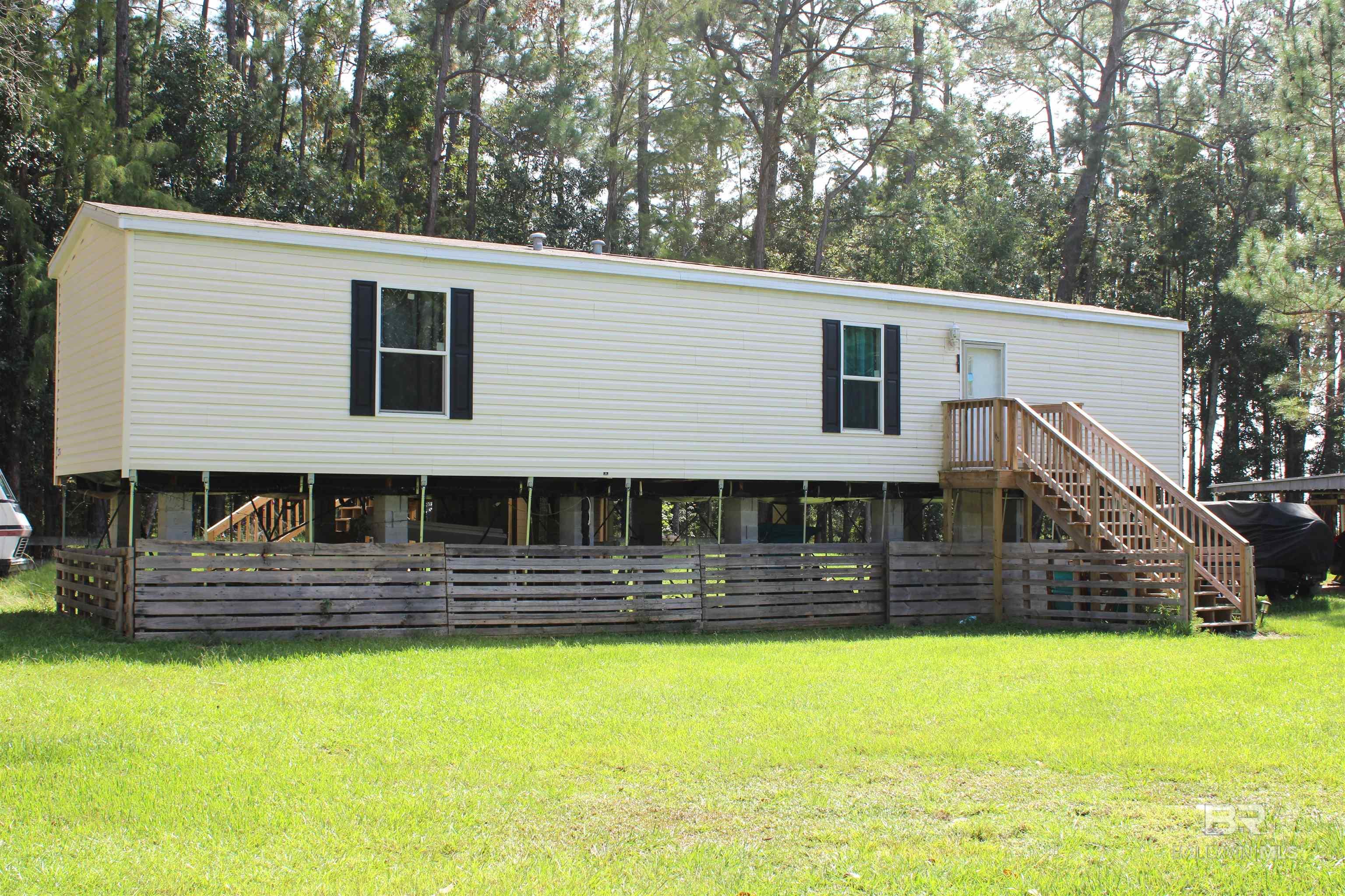 Are you looking for an affordable new home, weekend getaway, or investment property. The lots are canal front and also has a private deeded community beach on Mobile Bay that is just a two-minute, walk to watch the most amazing sunsets in the area. This home is located at the end of a dead-end street is a small low-density community. Home is like new as it has been a weekend retreat and has been used very little.