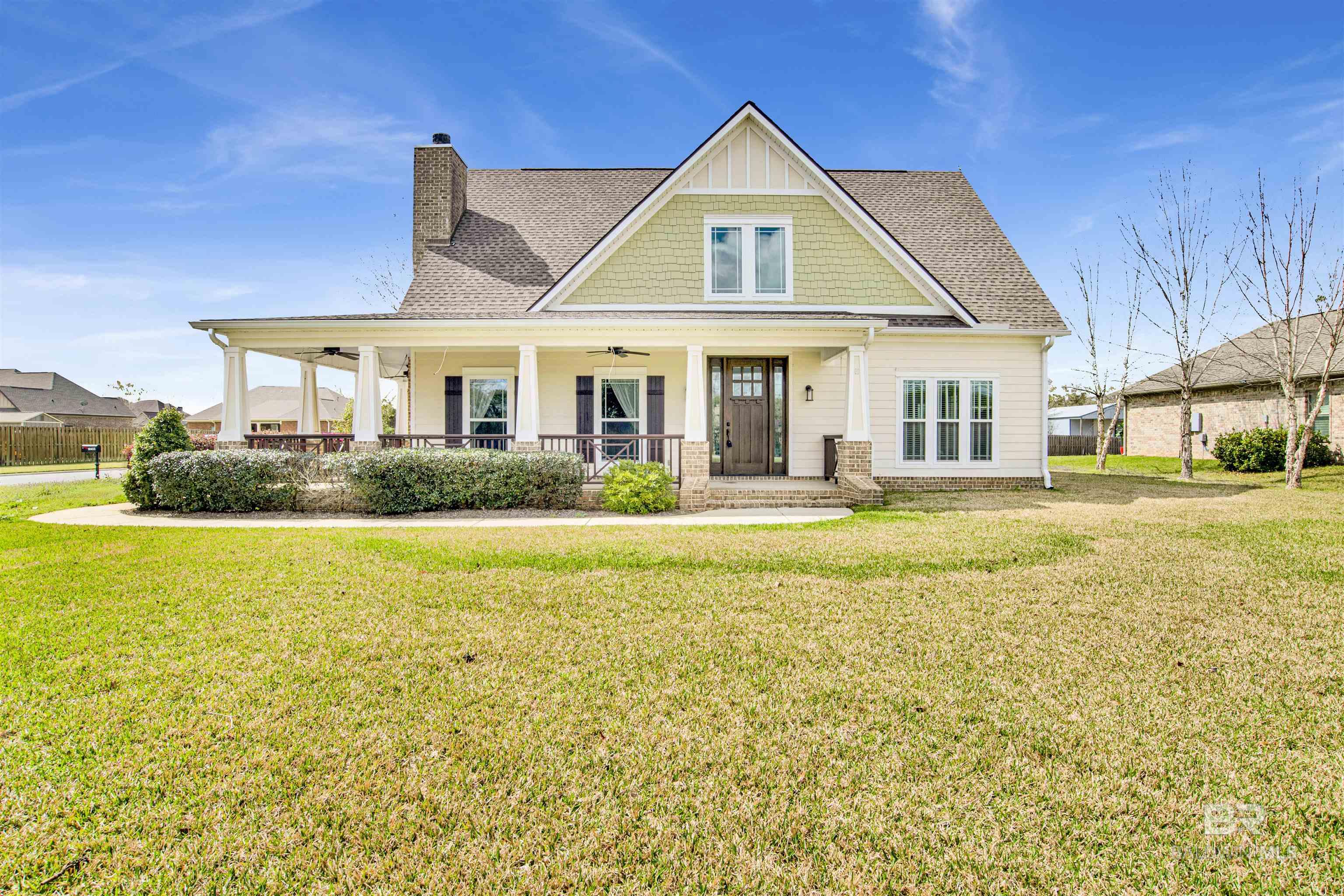 Welcome home to highly sought after Waterford Subdivision!  Centrally located on the edge of Daphne, you're just minutes from the interstate and Alabama's Gulf Coast!  This truly custom craftsman boasts so many upgrades.  Scored and stained concrete floors on the lower level, stone counters throughout, custom trim package, cozy wood burning fire place, stainless appliances, custom chefs kitchen, wrap around front porch, MASSIVE 15 X 22 bonus room, screened in back patio, two car garage and the list goes on!  This home has been meticulously maintained and is ready for its new owners.  Call your favorite agent today for your private tour!