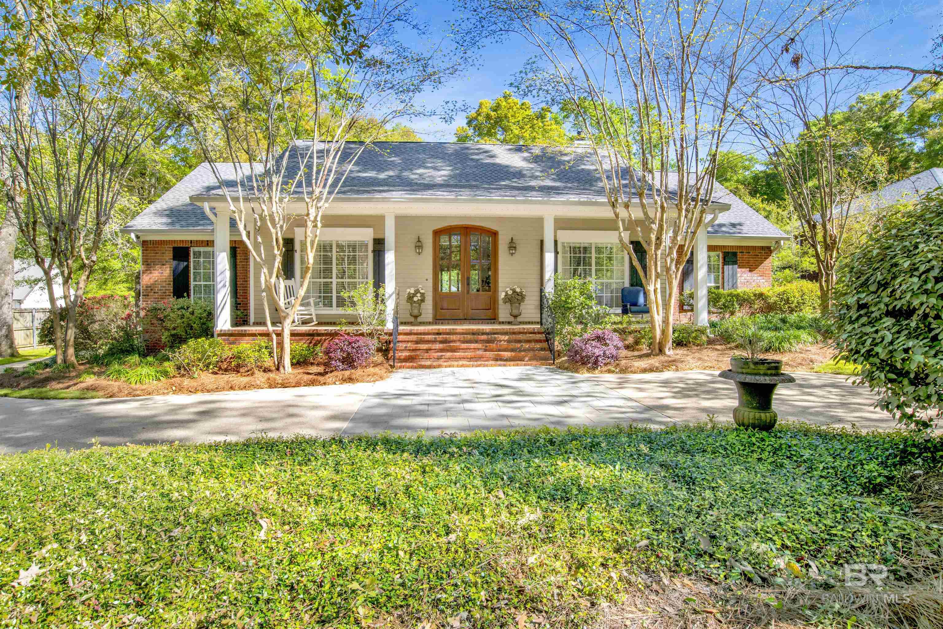 Welcome to this charming updated 4-bedroom, 3-bathroom home with sparkling pool, nestled in the heart of Olde Towne Daphne. Enjoy the convenience of walking, biking, or golf carting to nearby schools, shopping centers, restaurants, churches, and the breathtaking Mobile Bay sunsets. Situated on a spacious and picturesque wooded lot, this home offers a tranquil retreat from the hustle and bustle of everyday life.  The backyard oasis features a refreshing pool, perfect for creating cherished outdoor memories with friends and family. Meticulously maintained, this home exudes pride of ownership, ensuring a turnkey living experience for its new owners.  Experience the vibrant community of Olde Towne Daphne, known for its friendly residents, thriving businesses, and abundant natural beauty. Don't miss out on this incredible opportunity to own a piece of paradise in this sought-after area. Schedule your showing today!