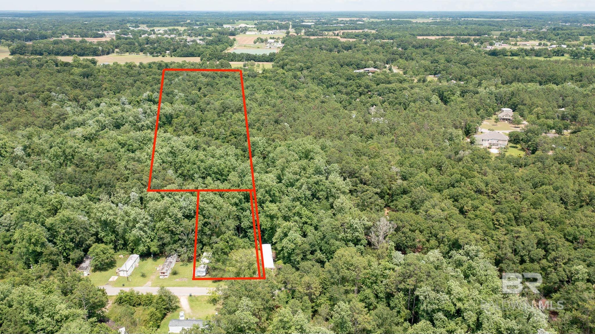 Great location in the heart of Loxley. 10.6 beautiful acres ready for you to build your beautiful dream home. Many possibilities with this property. Property to be sold with the .68 acre PPIN# 103660 lot and .07 acre PPIN# 111366 lot. There is a Mobile home on the .68 acre lot and to be sold at NO value. Please do not enter the Mobile home due to Safety Hazard. There is a New Survey in MLS Documents. Offers only to be considered with adjacent lots . All information deemed reliable but not guaranteed. Buyer to verify all information deemed pertinent.