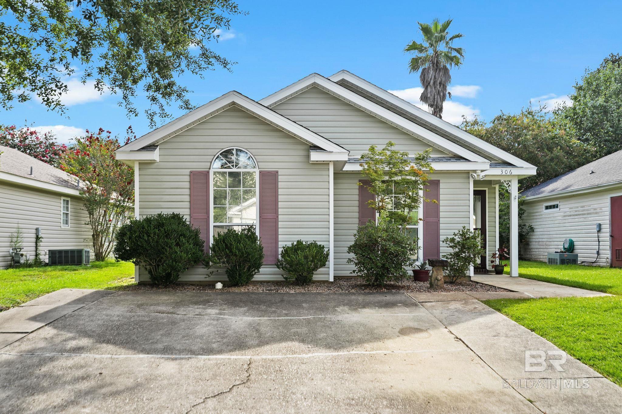 Welcome Home to this adorable cottage nestled in Fairhope, AL offering 3 bedrooms, 2 bathrooms, a fully fenced backyard.  When you walk in you are greeted by the foyer that opens up to the living room.  Living room offers high ceilings and a fireplace. Kitchen offers plenty of cabinet/counter space with an eat in kitchen and breakfast bar.  Off of the living room you will find a hallway that leads to the bedrooms. Primary bedroom has high trey ceiling,  large walk in closet and private bathroom with shower/tub combo.  As you walk out the back door off of the kitchen you have a covered back porch, extended covered back patio and nicely manicured backyard with a storage shed!    Buyer to verify all information during due diligence.