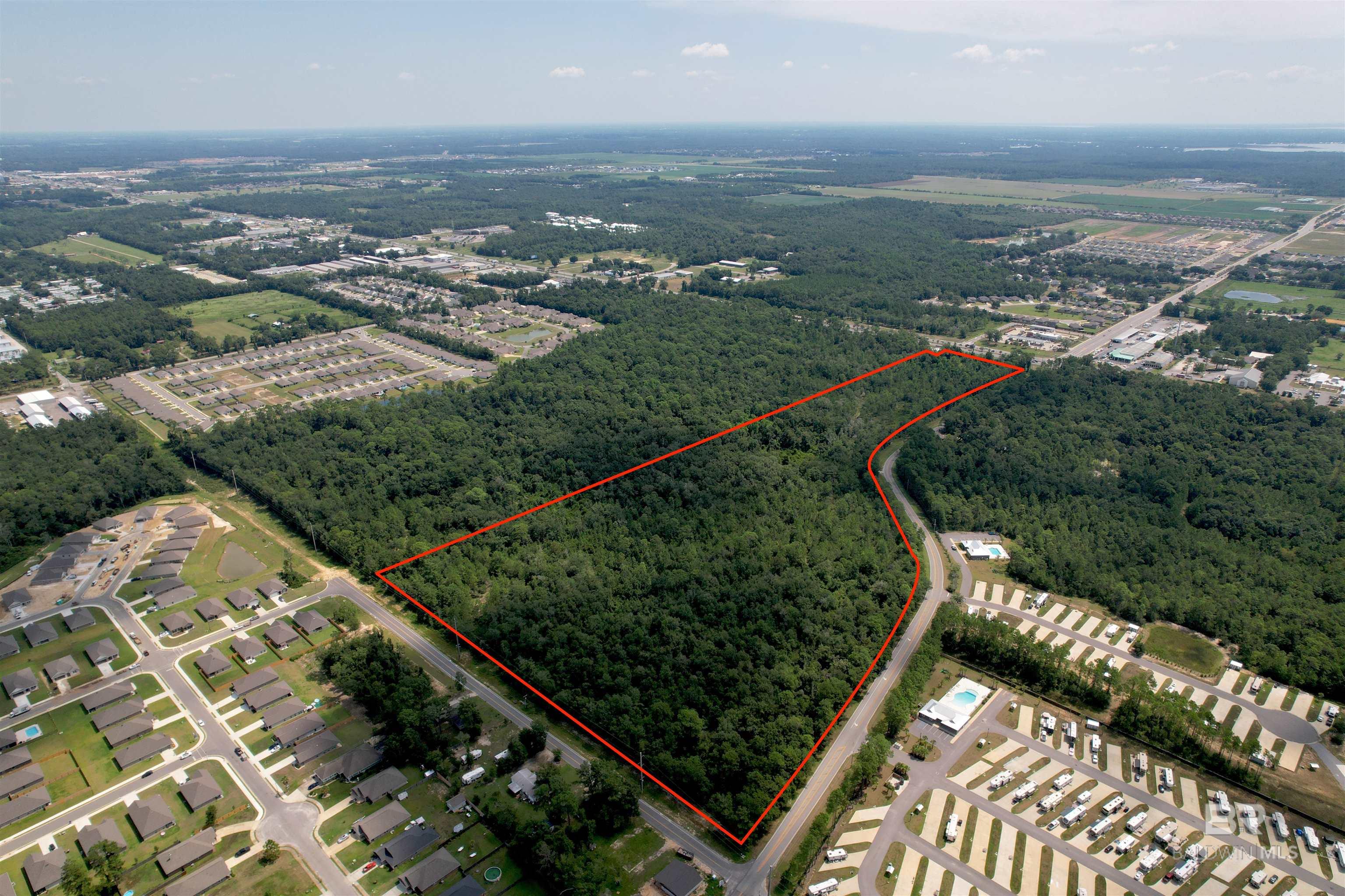 Prime visibility! Tremendous potential! Located on intersection of HWY 59 and Co Rd 8, with over 3000 ft total road frontage of Hwy 59, Co Rd 8 and Grund ln, allowing for multiple access points and easy divisions. Per County Planner - Un-zonned.This is the assemblage of two adjacent parcels - PPIN 618482 (28 ac) and PPIN 228861 (11 ac). Buyer to verify all information during due diligence.