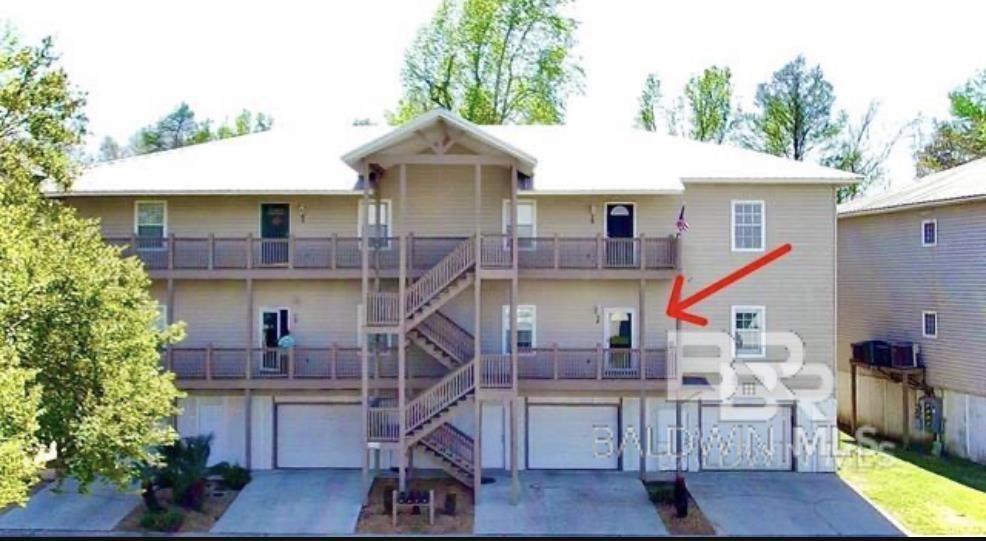 Don't miss out on your opportunity to own a piece of paradise right along Mobile Bay with amazing sunsets! This 3 bed, 2 bath Sunset Bay Villa condo offers 1,680 square feet of living space with high ceilings throughout. The large kitchen boasts granite countertops and energy efficient stainless steel appliances with a good amount of cabinetry. The spacious living room has updated modern tile flooring that leads out into the huge back porch with a beautiful wooded backdrop. You'll love the southern charm with elegant crown molding, recessed lighting, and plantation shutters. The master bathroom suite offers a double vanity sink, walk-in closet, and jacuzzi tub. There is elevator access right into the front porch. Sunset Bay Villas offers an aesthetically pleasing fishing pond with fountain, a gazebo/grilling area, an outdoor pool with a hot tub, and a private pier leading into Mobile Bay! This Unit has been priced to sell! Buyer to verify all information during due diligence.
