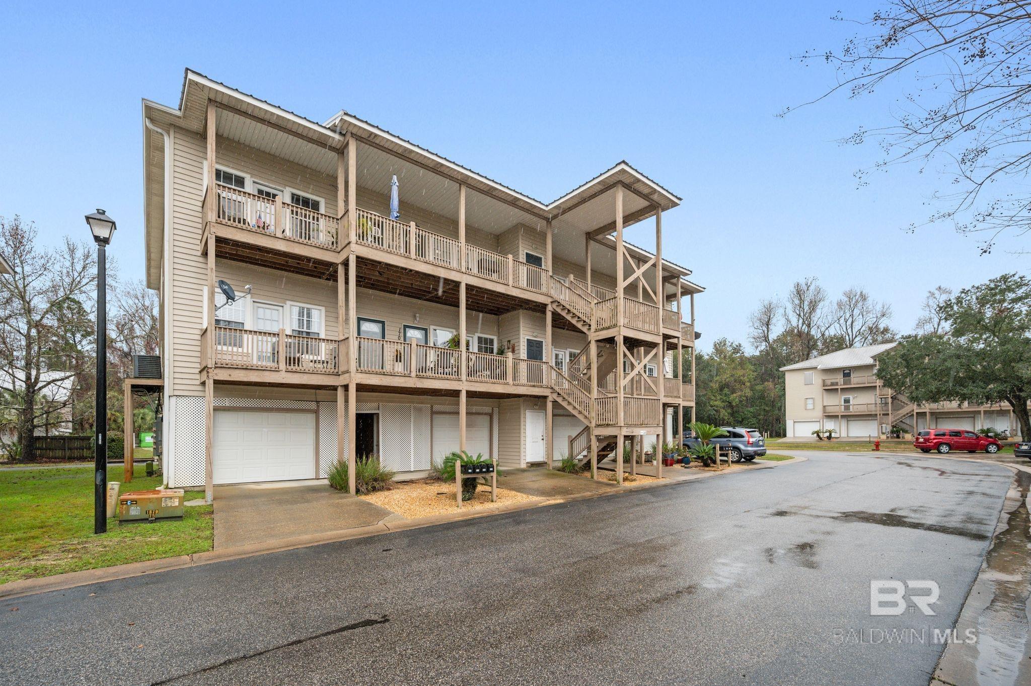 PRICED under $200,000! Stunning 2-Bedroom Condo with Breathtaking, Mobile Bay Views! Welcome to your dream retreat on the tranquil shores of Mobile Bay in beautiful Daphne! This meticulously maintained, fully furnished condo offers the perfect blend of modern comfort and coastal charm, making it an ideal getaway or a permanent residence.  Wake up to stunning sunrises and unwind with picturesque sunsets and the serenity of bay life. Step inside to discover a beautifully designed space featuring modern furnishings that create a warm and inviting atmosphere. The open-concept living area is perfect for entertaining, while the well-appointed kitchen boasts contemporary appliances and ample counter space. Dive into relaxation with access to the community pool, or take a leisurely stroll around the tranquil pond. Enjoy direct access to the pier, where you can fish, kayak, or simply soak up the sun.  Convenience is at your fingertips! This condo is ideally situated close to I-10, offering easy access to shopping, dining, and top-rated schools. Enjoy the best of both worlds with a peaceful bay front lifestyle and proximity to urban amenities. Don’t Miss This Opportunity! Whether you’re looking for a weekend getaway, a rental investment, or a place to call home, this condo is the perfect choice. With its unbeatable location and exceptional features, it won’t last long! Schedule a private showing today and take the first step towards owning your slice of paradise on Mobile Bay! Your coastal oasis awaits! Buyer to verify all information during due diligence.