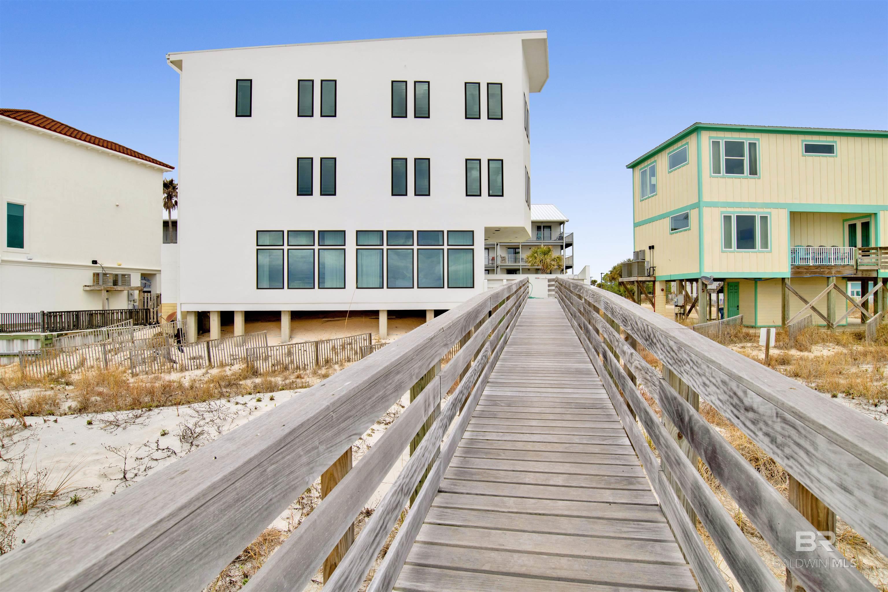 Ideally located in Orange Beach, this home has a direct Gulf front view. As you enter the gate you are welcomed by a private pool with large sun deck surrounded with a private concrete wall. Features an expansive open floor concept on the main floor that is perfect for entertaining. Kitchen hasupgraded appliances and quartz counter tops. The main living space has floor to ceiling windows overlooking the white sandy beaches and Gulf of Mexico. The 2nd level of the home features a primary bedroom, with 2 additional bedrooms- all bedrooms are Gulf front with thier own private bathroom. The 3rd floor has an additional primary with private bath, 2 more guest rooms, and a bonus bunk room. This modern style 6 bed/7.5 bath (with bunk room) home was designed with attention to detail in every way. Full set of engineered plans available upon request for serious buyers. Buyer to verify all information during due diligence.