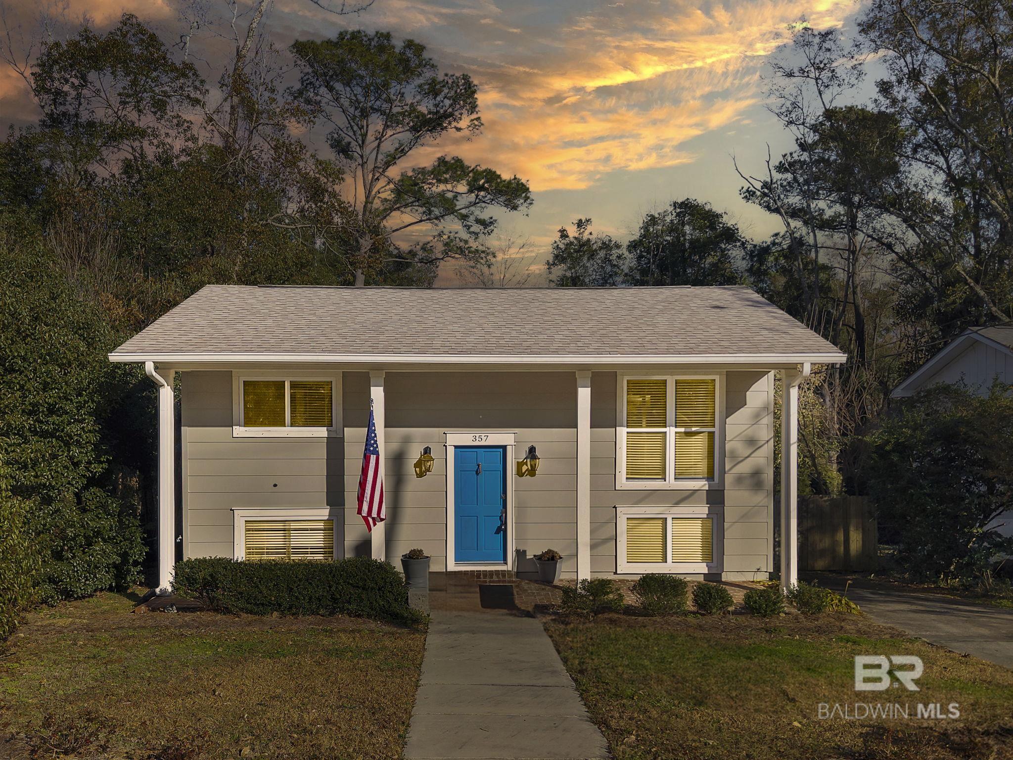 Incredible Opportunity to Own in the Fruit and Nut Section of Fairhope!!! Just 0.7 miles from the iconic Fairhope Clock downtown and a quick bike ride or walk to Mobile Bay, this charming home offers the best of Fairhope living. BEAUTIFUL & PRIVATE, the deep 254-foot lot features a fenced backyard with rear access, providing ample space for outdoor activities.Inside, enjoy a freshly painted and updated interior, including granite countertops in the kitchen and all three bathrooms. The flexible fourth bedroom can also serve as a downstairs den, allowing for a variety of living arrangements. A spacious laundry room with a separate sink adds convenience, while a mudroom/storage area is perfectly situated at the patio entrance.Originally rebuilt from the studs out in 2018, the home boasts recently replaced windows and a roof. Upstairs, the newly carpeted primary bedroom and second bath offer added comfort.Don't miss this incredible opportunity to own a beautifully updated home in a prime location near downtown Fairhope and Mobile Bay! Buyer to verify all information during due diligence.