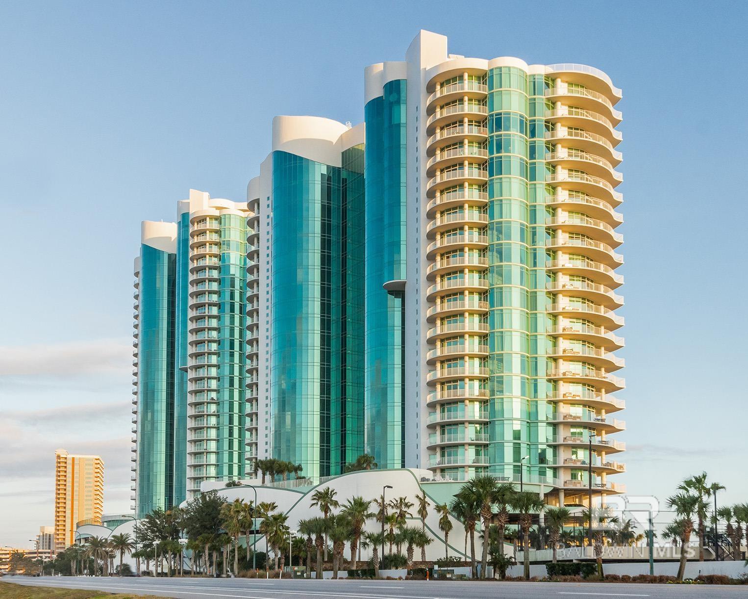 Situated on the twenty-ninth floor of tower C of Turquoise Place overlooking the beach and the Gulf of America, this remarkable water-side condo is the pinnacle of luxury. This spacious and coastal furnished condo provides the perfect getaway experience for any family, friend group, or corporate retreat. The living room and dining room create breathtaking views of the beach and the Gulf of America.The kitchen is fully equipped with a double door, stainless steel refrigerator and freezer combo, stacked microwave and oven, a sleek stove top range, toaster, and coffee maker. Mix up drinks from the wet bar that features an ice maker, blender, and wine cooler. Step out onto the private balcony and cook dinner on the stainless steel grill, then slip into your private hot tub with panoramic views of the Gulf of America.This condo, sleeping 18, has 5 spacious bedrooms and 4.5 bathrooms. The two Master bedrooms each have a King bed, flat screen TV, and a breathtaking view of the Gulf. The adjacent master bathrooms have a spa jet tub, double vanity, and walk-in shower. The first guest bedroom features a King-sized bed, flat screen TV, and attached bathroom. The second guest bedroom features a Queen bed, flat screen TV, and attached bathroom. The Media Room features two Full-over-Full bunk beds both with Twin trundles, and a flat screen TV. While staying in this lavish unit, you'll have access to Turquoise Place amenities such as the Lazy River, Direct Beach access, endless pools, tennis courts, and more. Schedule a Showing Today! Buyer to verify all information during due diligence.