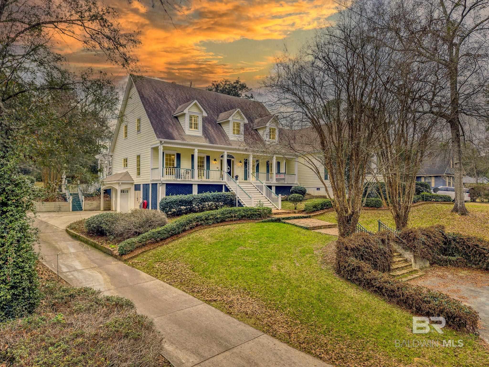 This stunning 5-bedroom, 4 full-bath, and 3 half-bath home seamlessly blends style, comfort, and convenience. Located within walking distance to both the town and the bay, this home offers modern living with easy access to amenities and nature.Key Features: Spacious Master Suite: Enjoy a cozy fireplace and a private ensuite bath. Chef’s Kitchen: A massive island perfect for cooking and entertaining. Two Fireplaces: One in the living room and one in the master bedroom for added warmth. Outdoor Retreat: Relax on the covered patio by the sparkling pool, with a convenient half bath nearby. Basement Workshop: Ideal for projects, with an additional half bath.Upgrades Include: Master bedroom patio, pool, and deck resurfaced, new plantation shutters, 3 new AC units, new double ovens, refrigerator, microwave & cubby, new wine cooler, remodeled master bedroom and much more!Don’t miss your chance to own this exceptional home and experience luxurious coastal living at its finest!  Buyer to verify all information during due diligence.