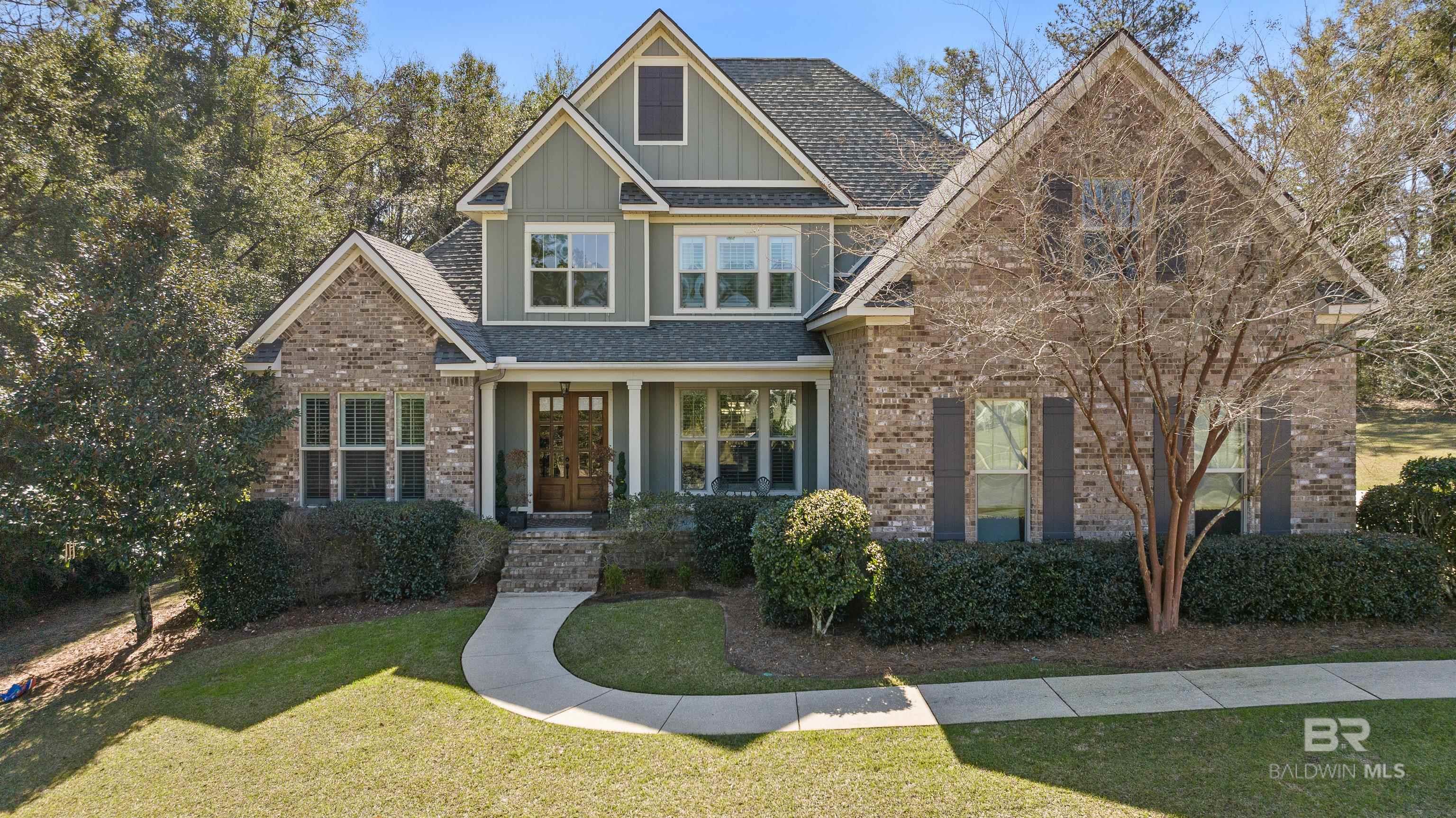 Stunning 4-Bedroom Home with Bonus Room & Office in Prime Location! Welcome to this beautifully designed 4-bedroom, 3.5-bath home featuring a bonus room, keeping room, and separate office. This home offers a spacious and inviting layout with high ceilings, crown molding, and recessed lighting throughout. The main level features beautiful hardwood floors and tile throughout. The open floor plan invites modern living, with a double-sided fireplace creating a warm and elegant atmosphere between the living room and the cozy keeping room. The chef's kitchen is a standout, featuring a gas cooktop, a large hidden walk-in pantry, large island, and ample counter space, making meal prep a breeze. The laundry room includes a laundry sink for added convenience. The large dining room has plenty of room for entertaining. The main-level primary suite is a true retreat, boasting a spa-like bath with a large soaking tub, separate shower, double vanities, and a spacious walk-in closet. Upstairs, you'll find three additional bedrooms, a versatile bonus room, and two full baths with tiled showers and one with a Jack-and-Jill layout. This home is perfectly situated on a huge lot with a private and wooded back yard. You will look forward to relaxing on the front or back covered porches. Located in a highly sought-after neighborhood, this home is just minutes from top-rated schools, shopping, and I-10, offering both convenience and community living. Don't miss out on this incredible home, schedule your showing today! Buyer to verify all information during due diligence.