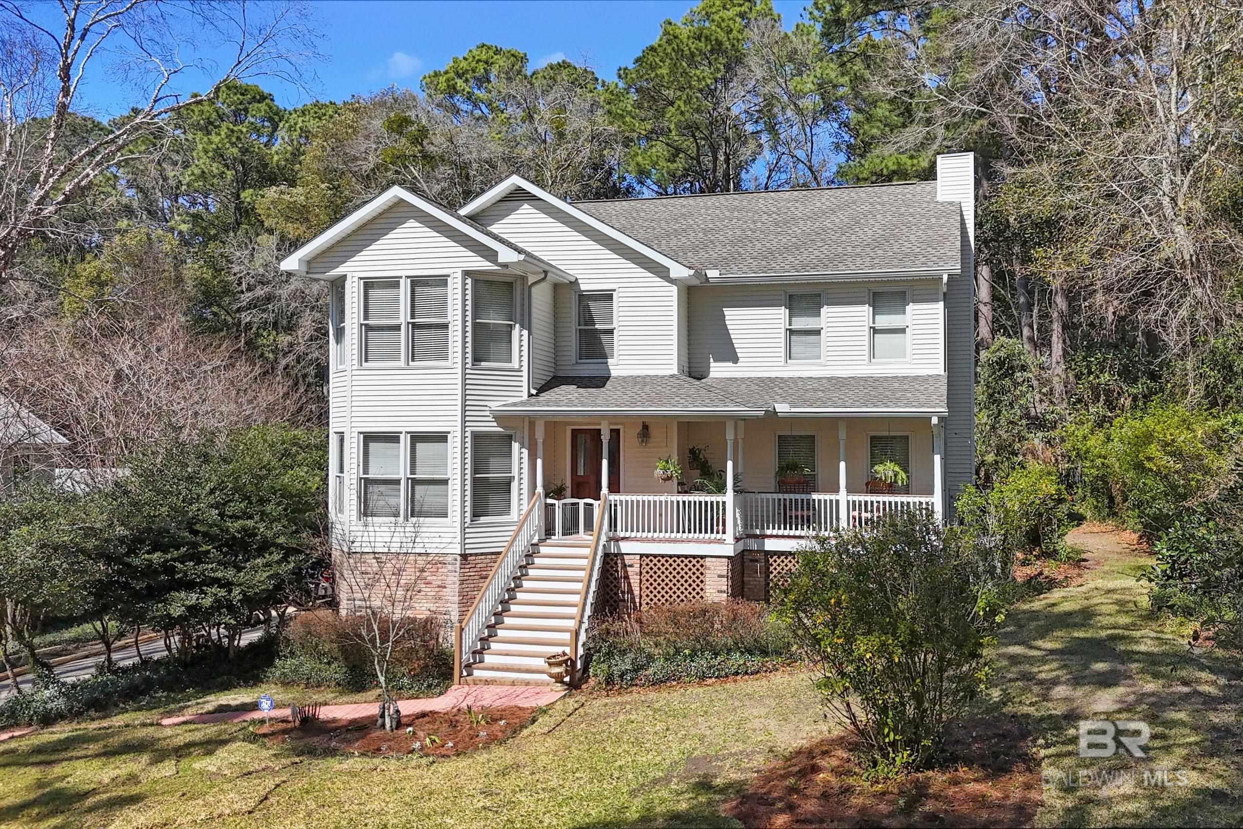 Located in the heart of Olde Towne Daphne!! This stunning 4 bedroom, 3.5 bath home with a Fortified roof is steps away to downtown shops, restaurants, mobile bay, schools, tennis/ pickleball courts and the vibrant parade route. The glass enclosed heated and cooled porch offers year-round enjoyment and overlooks a beautiful pool, creating the perfect indoor-outdoor living experience. The front and back yard is a true oasis, complete with satsuma trees and blueberry bushes, providing fresh fruit right at home! Don't miss this rare opportunity to own a home in one of Daphne's most sought after locations!! Buyer to verify all information during due diligence.