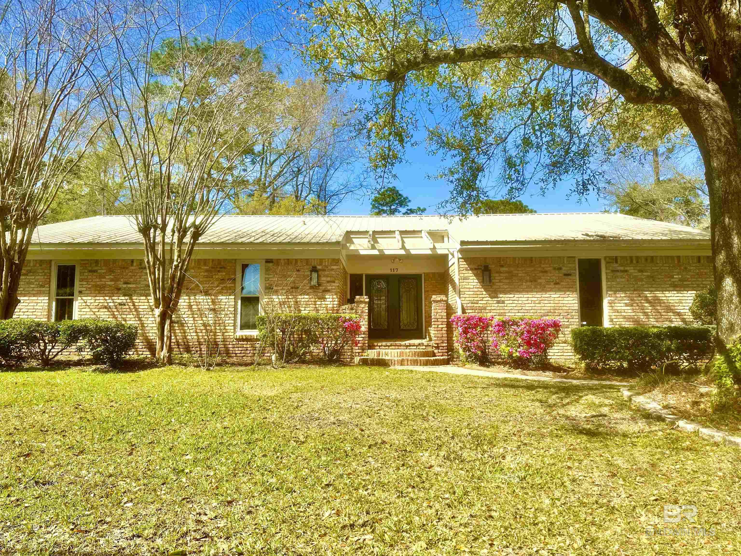 “This home is just under 3,000sq ft and has a wonderful Mother-in-law suite with it's own entrance! Located in a fantastic neighborhood just minutes from downtown! Each bedroom has it's own bath. There's a office, a den, a gorgeous sunporch with a fantastic yard on a huge corner lot! Enjoy the perfect blend of convenience and tranquility with nearby shops, restaurants, and schools, all while nestled in a peaceful, friendly community. With its inviting layout and great location, this home is a must-see!” Buyer to verify all information during due diligence.
