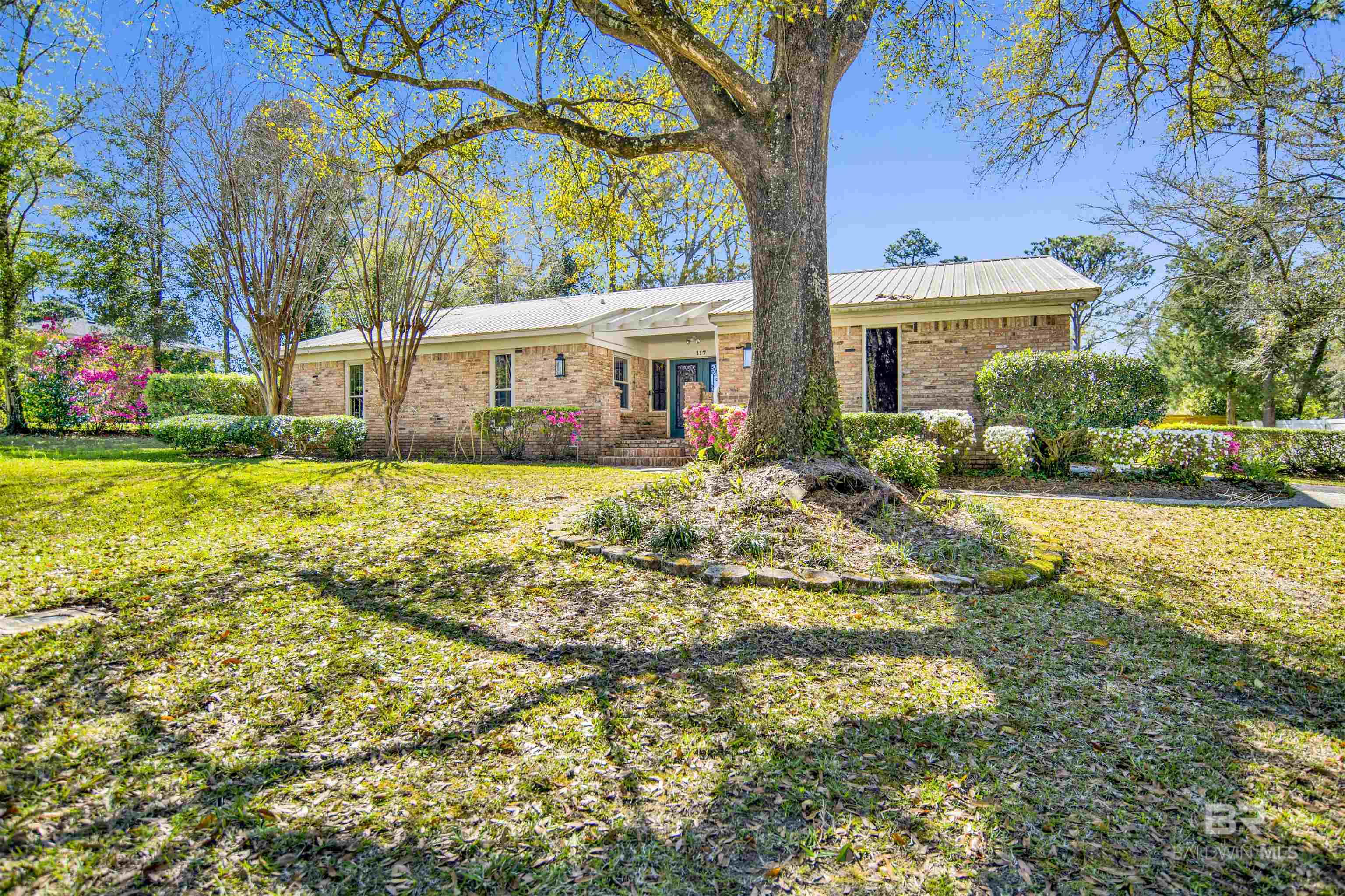 “This home is just under 3,000sq ft and has a wonderful Mother-in-law suite with it's own entrance! Located in a fantastic neighborhood just minutes from downtown! Each bedroom has it's own bath. There's a office, a den, a gorgeous sunporch with a fantastic yard on a huge corner lot! Enjoy the perfect blend of convenience and tranquility with nearby shops, restaurants, and schools, all while nestled in a peaceful, friendly community. With its inviting layout and great location, this home is a must-see!” Buyer to verify all information during due diligence.