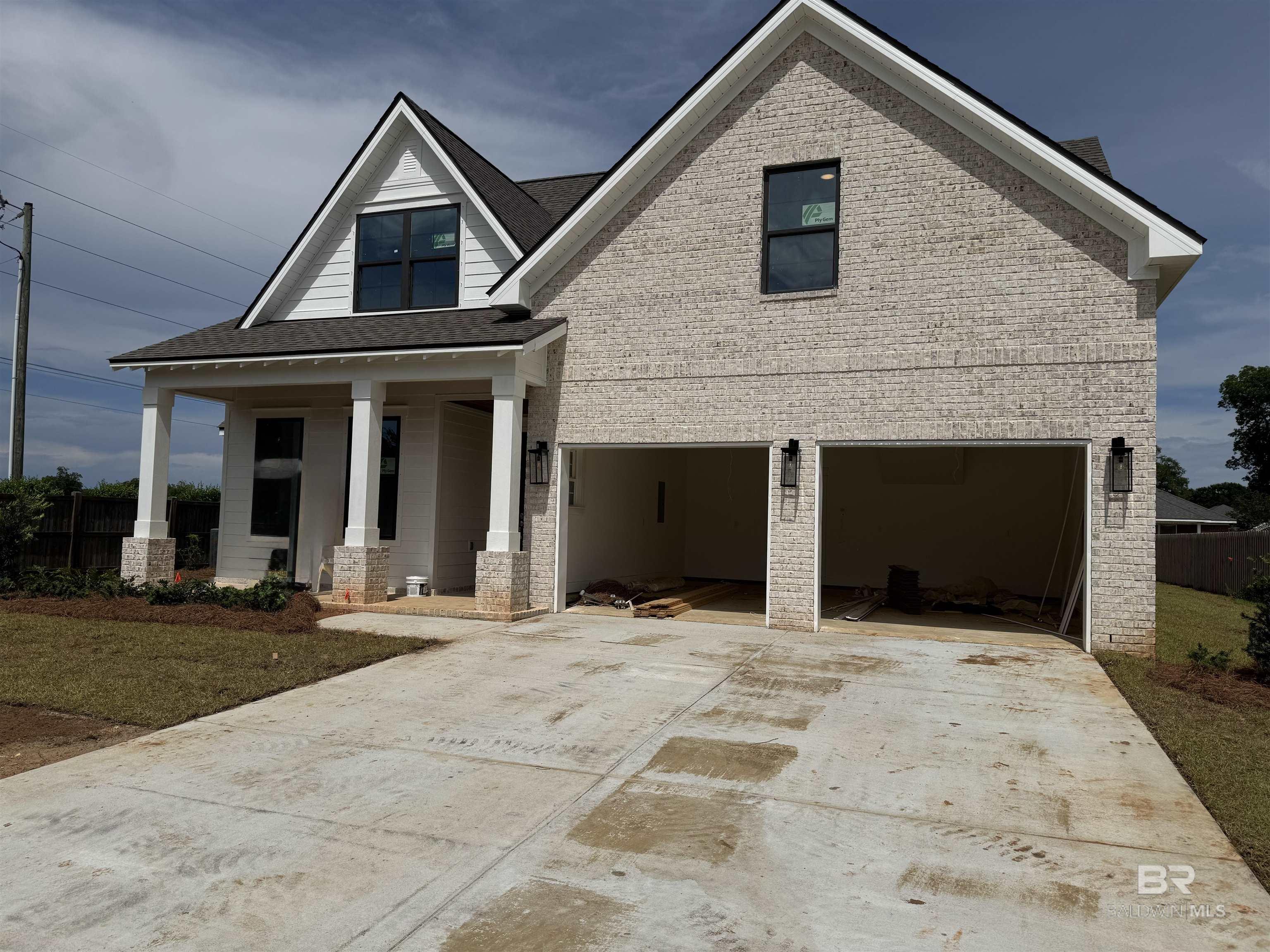 UNDER CONSTRUCTION* Discover the perfect blend of style and functionality in the Pinehurst plan from Tower Homes. This thoughtfully designed home offers 4 bedrooms, 3.5 baths, a private study, and a spacious living area, ideal for work, relaxation, and entertaining. Enter from the covered front porch into a welcoming foyer leading to an open-concept kitchen, dining, and living area with vaulted ceilings and large windows for natural light. The kitchen boasts quartz countertops, stainless steel appliances, a large, flush island with an apron front sink, a walk-in pantry, and custom cabinets. A drop area and a large laundry room with storage cabinets add convenience near the two-car garage entry. The 1st floor primary suite features a walk-in closet and a luxurious en suite bath with a soaking tub, double vanity, and a separate, tiled shower. A bonus room/study finishes off the main floor and includes a walk-in closet, making it perfect for an office or guest room. Upstairs, you'll find 3 additional bedrooms and 2 well-appointed bathrooms, including linen storage. Outdoor living is just as inviting, with a rear, covered porch, perfect for enjoying your morning coffee. Every detail of the Pinehurst plan is crafted for comfort, convenience, and timeless elegance. Located in the Bailey Place subdivision, this home is minutes from Hwy 181, Hwy 98, and I-10, close to schools, shopping, and more. Gold Fortified, the home includes a 1 yr builder warranty, 10 yr PWSC structural warranty, and a 1 yr. Termite bond with Formosan coverage. One or more principals of the selling entity are licensed real estate agents and or Brokers in AL. Est. Completion JUNE 2025* Floor plans are “for example” only. Buyer to verify all information during due diligence.