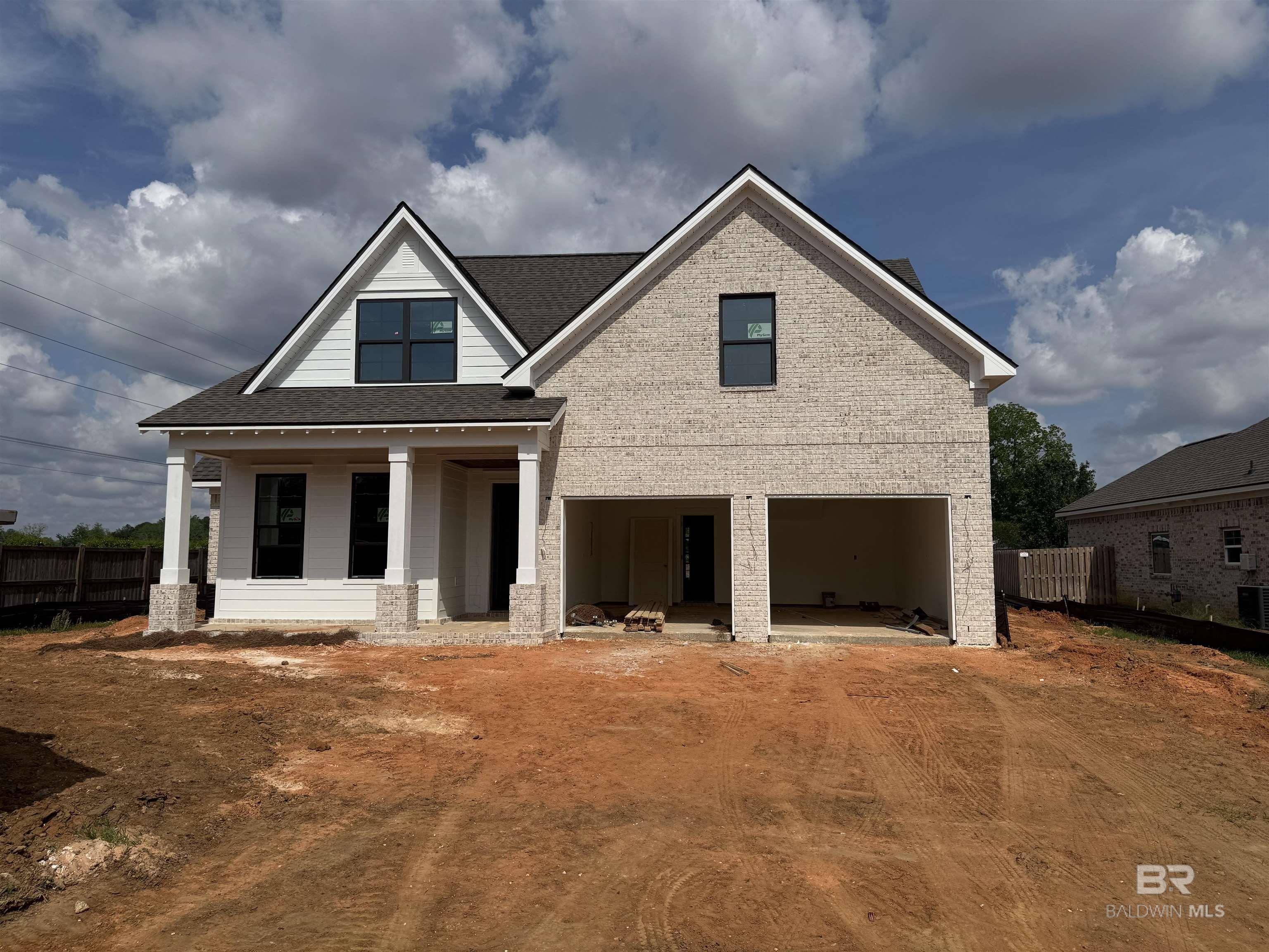 UNDER CONSTRUCTION* Discover the perfect blend of style and functionality in the Pinehurst plan from Tower Homes. This thoughtfully designed home offers 4 bedrooms, 3.5 baths, a private study, and a spacious living area, ideal for work, relaxation, and entertaining. Enter from the covered front porch into a welcoming foyer leading to an open-concept kitchen, dining, and living area with vaulted ceilings and large windows for natural light. The kitchen boasts quartz countertops, stainless steel appliances, a large, flush island with an apron front sink, a walk-in pantry, and custom cabinets. A drop area and a large laundry room with storage cabinets add convenience near the two-car garage entry. The 1st floor primary suite features a walk-in closet and a luxurious en suite bath with a soaking tub, double vanity, and a separate, tiled shower. A bonus room/study finishes off the main floor and includes a walk-in closet, making it perfect for an office or guest room. Upstairs, you'll find 3 additional bedrooms and 2 well-appointed bathrooms, including linen storage. Outdoor living is just as inviting, with a rear, covered porch, perfect for enjoying your morning coffee. Every detail of the Pinehurst plan is crafted for comfort, convenience, and timeless elegance. Located in the Bailey Place subdivision, this home is minutes from Hwy 181, Hwy 98, and I-10, close to schools, shopping, and more. Gold Fortified, the home includes a 1 yr builder warranty, 10 yr PWSC structural warranty, and a 1 yr. Termite bond with Formosan coverage. One or more principals of the selling entity are licensed real estate agents and or Brokers in AL. Est. Completion July 2025* Floor plans are “for example” only. Buyer to verify all information during due diligence.