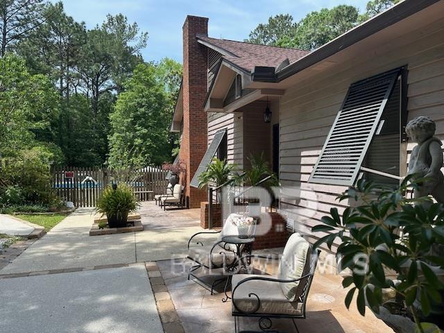 6.4 tranquil acres with two homes on D'olive Creek and IN TOWN:1 mile from Jubilee Square. 5 bedrooms, 4.5 baths. Cypress finished w/Cedar accents. 3863 sq ft, extra 1200+ sq ft basement storage area all under a Fortified Roof.. 400+ sq ft DECK on back of Home with 100% nature views. Whole house Generator. Gas Tankless water heater, New plumbing, New lighting. 2ND HOME is 30 x 40 Morton home w/stone accented front porch; open concept. single-car garage. Full RV hookup behind the home. This home is featured on Morton’s Website under “Daphne”.  Enjoy Peaceful walks on grounds, sit in the hammock by flowing D'olive creek or sit at the above-ground pool that features a gated pool deck w/patio area. Other features: 25x26 covered carport, 12x30x12 covered RV/boat carport w/30 amp hookup. The home has side entry Ramp just through the gate for accessing the home on wheels or crutches. Both homes: full home surge protection & whole-house carbon filter. City water, city sewer, and separate Well .  2 State of Alabama licensed agents. shown easily by appt.  Buyer to verify all information during due diligence.