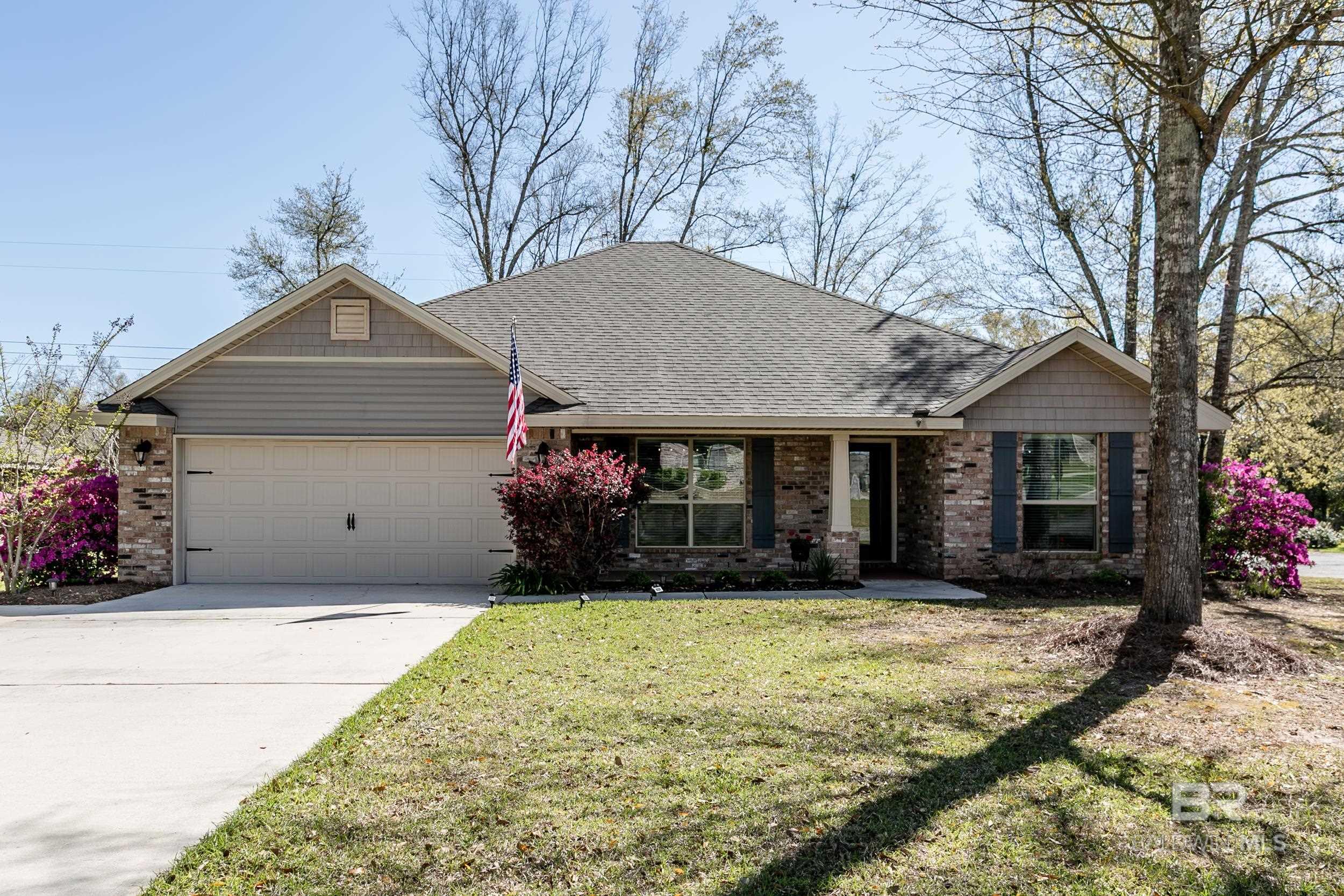 Stunning, 4bedroom/2bath home in Ashland Place! This home is located on a corner lot of a cul-de-sac, surrounded by beautiful azaleas and live oak trees! This property has quartz countertops in the kitchen and bathrooms, kitchen tile backsplash with stainless steel appliances, vinyl flooring throughout the main living areas and primary bedroom, crown molding, covered & screened in back patio, custom storage building, and more! Look no further for your next home! Buyer to verify all information during due diligence.