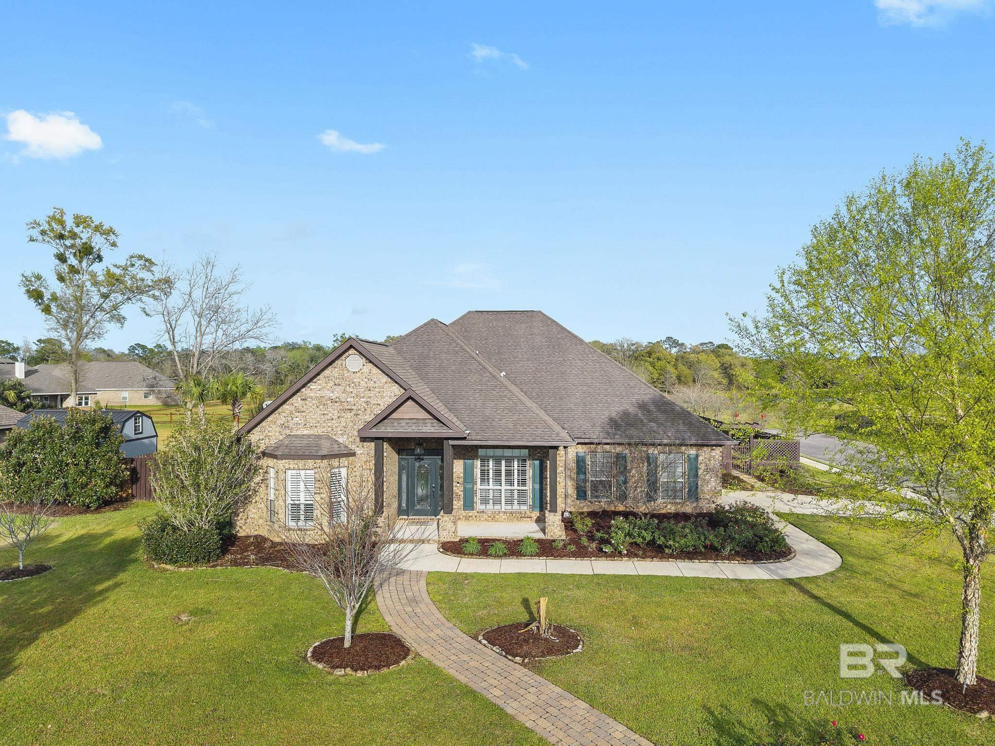Move in ready perfection! Spacious kitchen with stainless appliances and hard flooring throughout. Bright and cheerful Florida room and covered porch! Thoughtful floor plan with 5 bedrooms, 3 bathrooms, and an office are the NEXT best things about this desirable location, because you will get to Enjoy Eastern Shore seasons from a designer pool and hot tub, overlooking a pastoral view of common area and lake!  Expertly landscaped yards and stone path courtyard are fantastic enhancements to all the home has to offer. This is a one of a kind property and opportunity in fabulous Dunmore!  Schedule your tour today! Buyer to verify all information during due diligence.