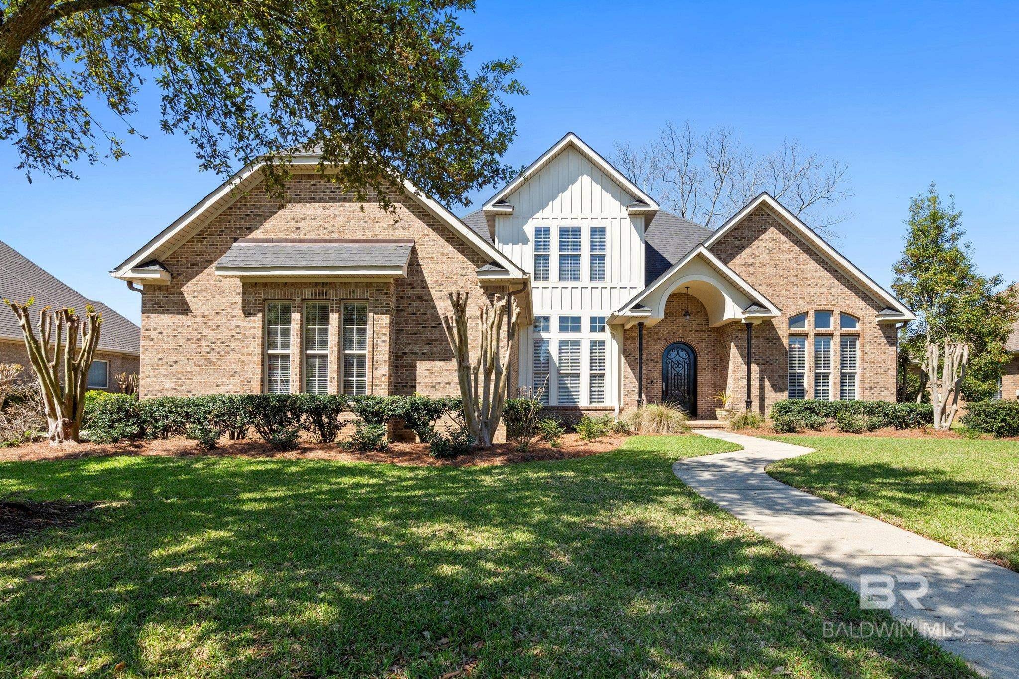 Welcome to this stunning custom brick home in the highly sought-after Bellaton neighborhood! This 4-bedroom, 3.5-bath residence offers 3,669 sq. ft. of exquisite living space, featuring hardwood floors throughout, 12’ ceilings in the living room, 14’ ceilings in the dining room, 8’ solid doors, and a striking barrel ceiling in the foyer. Step outside to your lanai-covered, gunite saltwater pool with a pool house and screened-in covered patio, creating the perfect setting for relaxation and entertaining. The home is equipped with a full-house generator, a fortified roof (2021), and a security system with camera for peace of mind. The spacious primary suite includes a sitting area, while the primary bath boasts a luxurious circular walk-through shower. Additional highlights include a pocket office on the main floor, updated landscaping, and two large, floored attic spaces for ample storage. The oversized double garage easily fits two cars plus a golf cart. Recent upgrades include one HVAC unit replaced (2023) two HVAC units replaced (April 2025), a KitchenAid gas cooktop (2021), a Frigidaire Gallery refrigerator (2021), a Miele dishwasher (2024), and a Frigidaire Gallery microwave (2024).  Includes a one-year home warranty. Schedule your private tour today! Buyer to verify all information during due diligence. The owner is a licensed real estate agent in the state of Alabama.