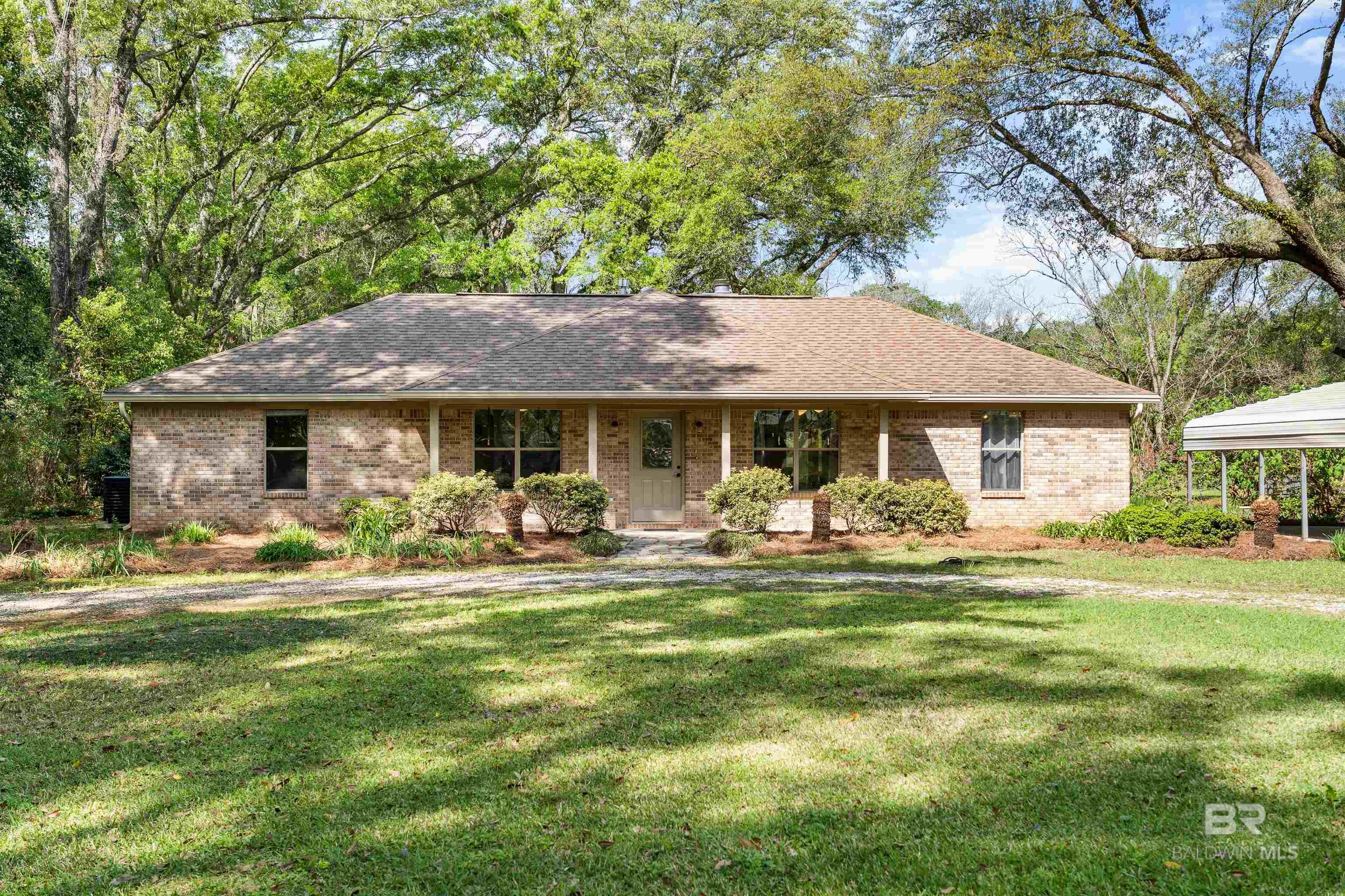 VERY NICE BRICK HOME SITTING ON 4.25 GORGEOUS ACRES! THE ACREAGE HAS BEEN DIVIDED INTO 4 DIFFERENT PARCELS. LEVEL LOTS, WITH BEAUTIFUL LARGE OAKS, PECAN TREES AND SEVERAL FRUIT TREES. STORAGE BUILDING IN BACK YARD. THE HOME HAS THREE SPACIOUS BEDROOMS AND TWO BATH. LIVING/DINING COMBO WITH HIGH CEILING. LAUNDRY ROOM WITH WASHER/DRYER INCLUDED. FIREPLACE IN LIVING ROOM WITH GAS LOGS. BREAKFAST ROOM OFF KITCHEN, CABINETS IN BREAKFAST ROOM ARE NEGOTIABLE, THEY ARE NOT ATTACHED. KITCHEN HAS GRANITE COUNTERTOPS, KITCHEN APPLIANCES ARE INCLUDED. SS APPLIANCES, DISHWASHER IS NEW. LARGE SUNROOM OFF LIVING ROOM TO ENJOY THE BEAUTIFUL LANDSCAPE AND SUNSETS. THERE IS AN OPEN PATIO FOR ENTERTAINING, ALSO. HOME IS CONVENIENT TO I10, SHOPPING, SCHOOLS, RESTUARANTS, AND MEDICAL FACILITIES. FURNISHINGS ARE NEGOTIABLE. Buyer to verify all information during due diligence.