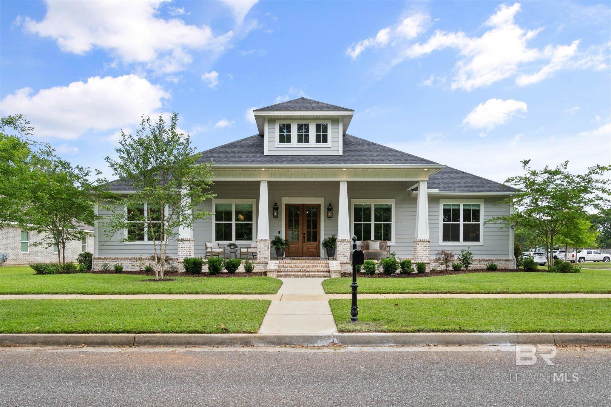 Peaceful Luxury in Historic Malbis! Z-Line appliances including a 48in gas range, soft close drawers, a walk-in pantry, oversized rooms, 10-foot ceiling and crown molding throughout, hardwood, tile, and marble floors, tongue and groove ceilings on the front porch and sunroom, Quartz countertops, and an oversized laundry room are just a few of the special features of this beautiful 2 years younghome. Sit on the front porch and enjoy the park like setting or enjoy the firepit in the private back yard. A large front porch welcomes you to this impeccable craftsman style home. 10 ft ceilings welcome you into the large foyer and bright and spacious dining room. The great room centers the home and opens to the kitchen, separate breakfast room, and huge sunroom that overlooks the manicured back yard. The split bedroom plan includes 3 bedrooms, 2 full bathrooms, and a laundry room south of the great room and a magnificentPrimary Suite to the north. Each guest bath is finished with the same detail as the primary. Marble floors, double vanity, storage, quartz counter tops, and floor space are among the special features that can be found. The guest rooms have 10 ft ceilings with crown molding and closet systems in each closet. The Primary suite boasts a large bedroom, 2 walk-in closets with closet systems, and a primary bath anyone would envy. Double vanities of quartz, over 5 ft soaking tub, a separate water closet and a walk-in shower over 7 feet deep spotlight this phenomenal en-suite. Every room has large windows and is light and natural with wonderful views. The sunroom is such a wonderful addition to this home. With windows all the way across the back, you can enjoy the beautiful and private backyard. The Generac 24kw generator will ensure your life doesn't stop in a storm. This house is designed perfectly for entertaining a large group or for an intimate dinner party. Don't miss this one! Buyer to verify all information during due diligence.
