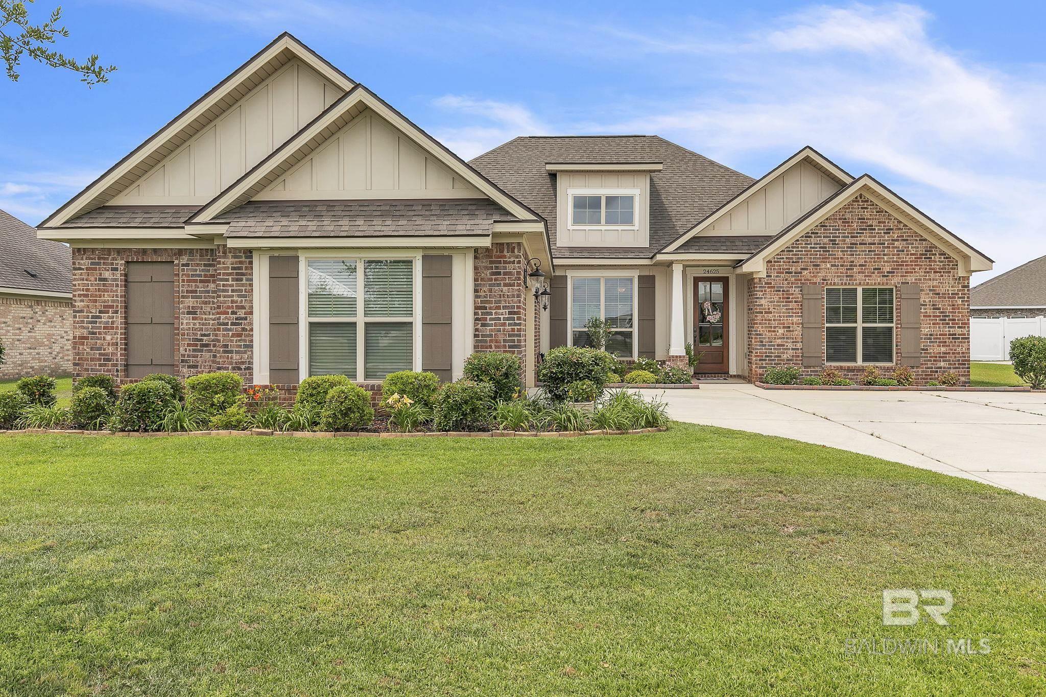 Beautiful 4BR/3BA Gold Fortified Home in Jubilee Farms. Located in the highly sought-after Jubilee Farms subdivision in Daphne, this full-brick, Truland-built home offers exceptional quality and thoughtful design. Home features an open floor plan with engineered hardwood flooring throughout the main living areas, a formal dining room, and a breakfast nook. The kitchen includes granite countertops, a large pantry, and stainless steel appliances with a drop in gas cooktop and separate oven and microwave mounted in the cabinetry. Enjoy the convenience of Smart Home Connect features including an Ecobee thermostat, Ring doorbell, and a security camera. The living room is centered around a gas fireplace, perfect for relaxing evenings. The primary suite offers two walk-in closets, split granite vanities, a tiled walk-in shower, and an oversized garden soaking tub. Outdoor living is made easy with a fully enclosed, screened, and extended back patio—ideal for year-round enjoyment. The backyard includes a swing, multiple fruit trees, raised garden beds and is fully fenced for added privacy. Additional upgrades include an 8-foot solid mahogany front door, tankless water heater and gas cooktop. Jubilee Farms amenities include a resort-style pool, adult pool (across the block from this home), clubhouse, fitness center, walking trails, and more. Buyer to verify all information during due diligence.