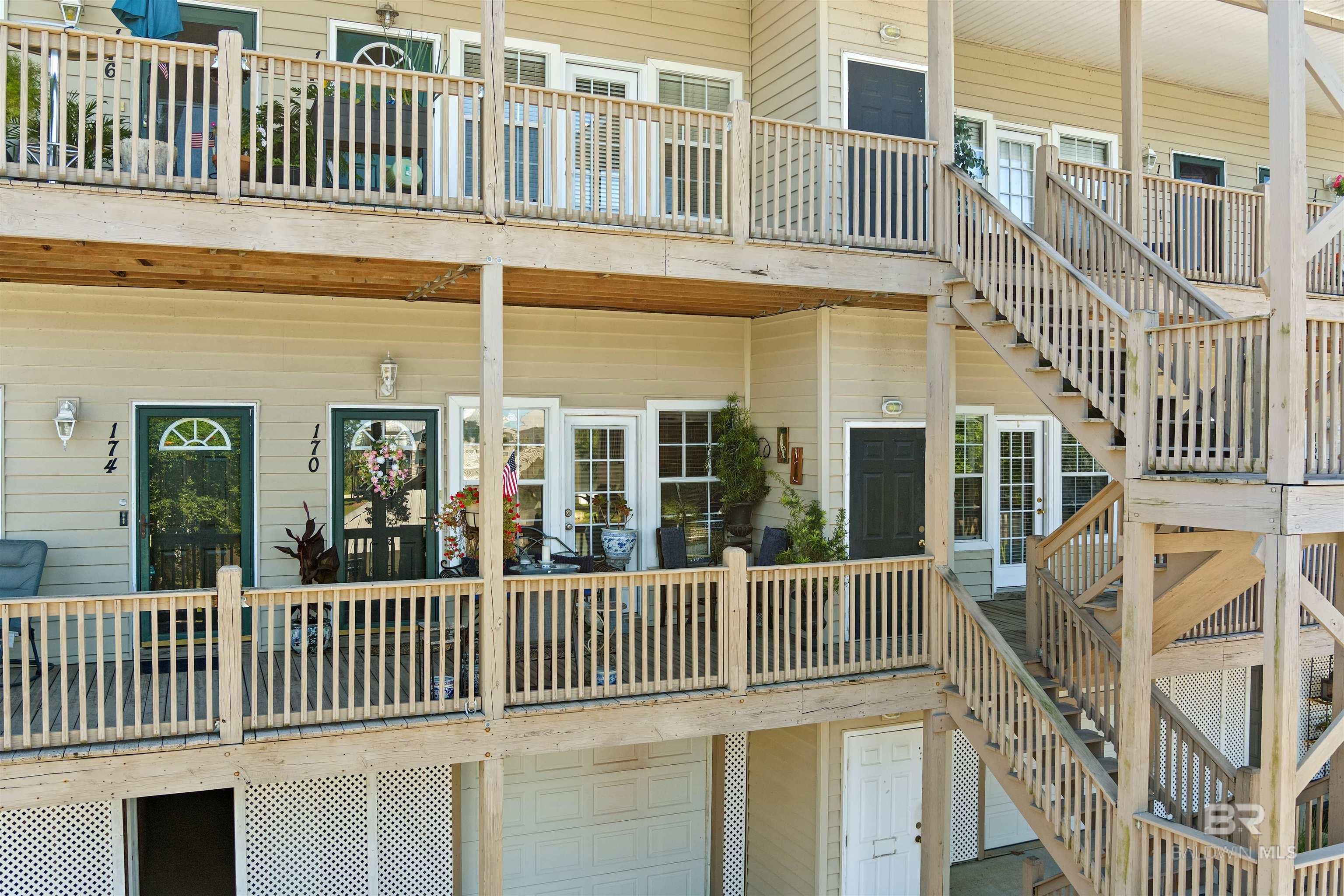 Looking for the bay area lifestyle?  Look no further than Sunset Bay Villas community in Daphne that sits on Mobile Bay one mile south of I-l0 convenient to Mobile and Pensacola.  A second home or permanent residence, this corner unit 2 bedroom/2 bath is in mint condition.  Primary Bedroom is large with two closets.  Primary bathroom includes a jet tub.  Bedroom 2 has its own bath.  Laundry includes double stack washer/dryer to convey.  Great living room, separate dining room, kitchen bar with passthrough to living area. The condo has a large, covered porch uniquely located across from the pond and grilling pavilion.  Private garage is under the unit and accessible from a private entrance on the back of the unit. The garage is big/deep enough for a car and golf cart. Covered stairs and elevator in building which is 3 stories. Unit 174 is on the second floor.  Enjoy afternoon bay sunsets, take a stroll on Mobile Bay, fish from the community’s pier, take a dip in the pool or take a couple of steps over to the Waterfront restaurant for an afternoon meal and chill time.  Living is great at Sunset Bay Villas! Buyer to verify all information during due diligence.