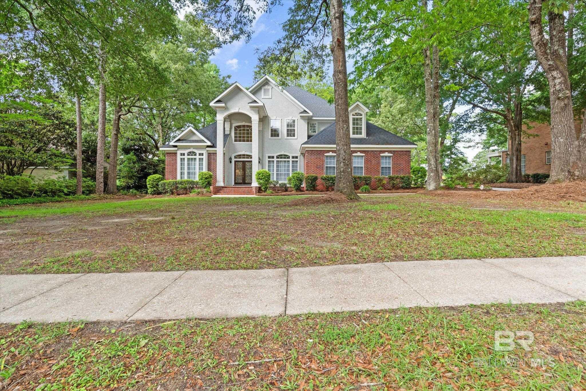 Beautiful Brick Custom-built One Owner Home is located on Timbercreek’s Golf Course. The Home features High Ceilings, Great Room with Fireplace and new Carpet, Formal Dining Room, Separate Office or Den, Primary Bedroom with Bath on Main level, Split Bedroom Plan with en-suite also on Main level, two more Bedrooms with Hall Bath and a Bonus Room upstairs, Screened Porch with Great Views, and a Side-entry Double Garage. Roof replaced 2019.  Close proximity to I-10 for easy commute to Mobile or Pensacola!  Hurry to see this one! Buyer to verify all information during due diligence.