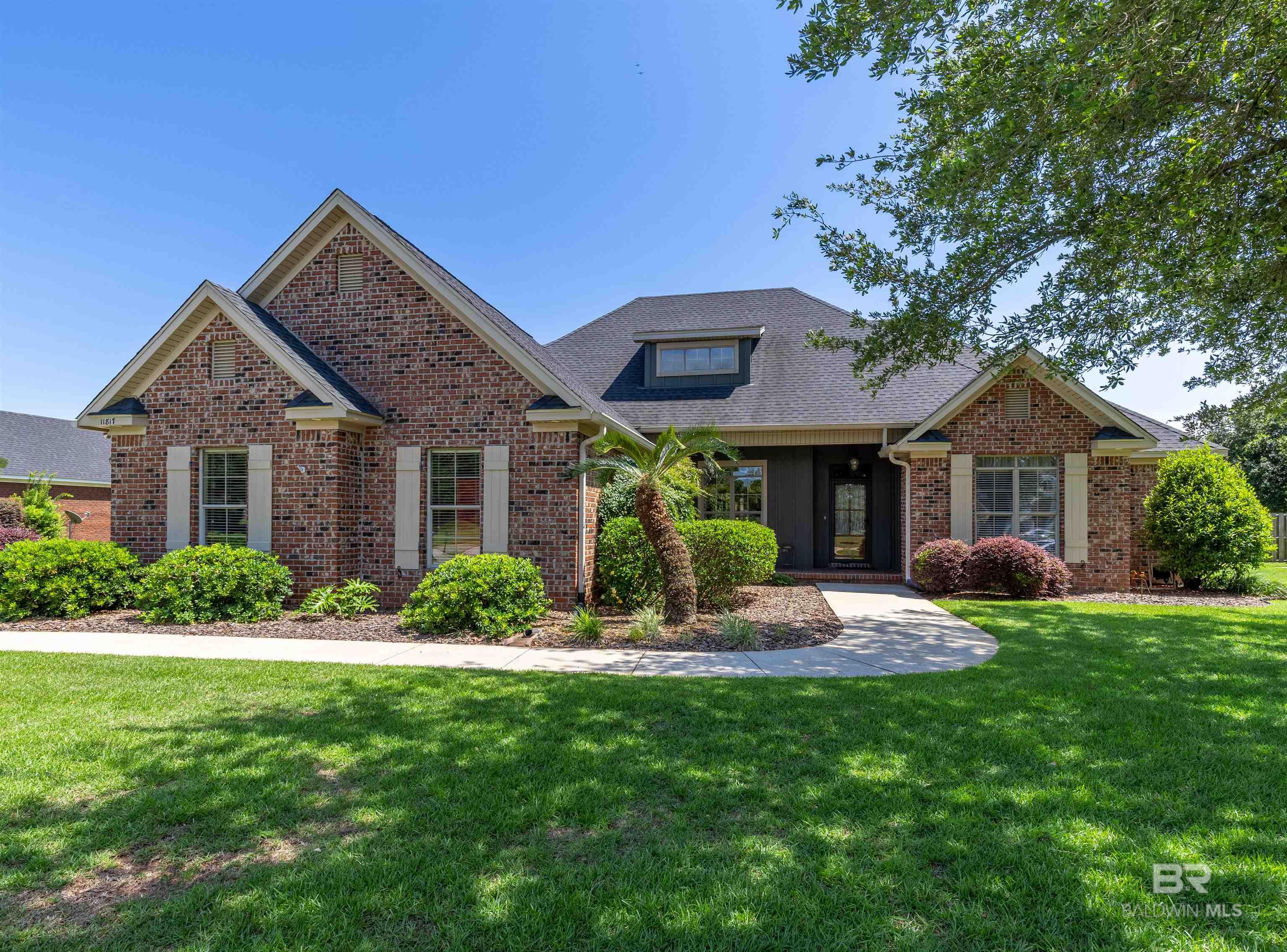 A MUST SEE IN SOUGHT AFTER AVALON OF DAPHNE.  Meticulously maintained home with a fortified roof and low utility costs.  Home has an open floor plan with a custom gourmet kitchen.  Wrap around bar has ample seating with separate breakfast area and a separate dining room.  Kitchen is loaded with cabinets and plenty of storage.  Split floor plan w/ separate office and/or media room. Cozy, shaded back 21' x 12' screened in porch with tiled floors and awesome views of oversized back yard (plenty of room for a pool).  Landscape and courtyard are well designed and maintained.  Property also has a three car garage with plenty of storage.  This home has too many extras to mention all of them.  Schedule a showing today. Buyer to verify all information during due diligence.