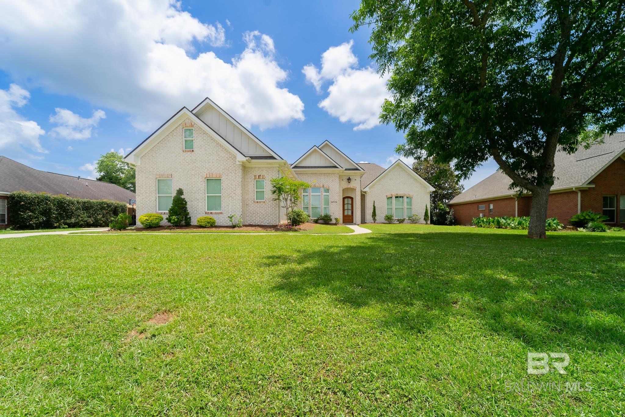 Welcome to 24936 Bosbyshell Avenue — a beautifully designed Gold Fortified custom home nestled on nearly one acre in the heart of Daphne! Built in 2022, this 4-bedroom, 3-bathroom home offers the perfect blend of luxury, space, and functionality, all within a peaceful, private setting.Step inside to find 2,769 square feet of thoughtfully designed living space, featuring all solid surface flooring throughout — no carpet anywhere. The open-concept layout is ideal for both entertaining and everyday living, with a spacious great room that flows seamlessly into the dining area and a modern, chef-inspired kitchen equipped with high-end finishes, custom cabinetry, and ample counter space.The split-bedroom floor plan offers privacy and comfort, with a spacious primary suite that includes a spa-like bathroom with double vanities, a soaking tub, separate tiled shower, and a large walk-in closet. The additional bedrooms are generously sized, and a dedicated guest suite or flex room adds versatility for multigenerational living or a home office.Energy efficiency is a priority, with a high-efficiency HVAC system, spray foam insulation, and energy-smart design throughout. Step outside to a fully fenced backyard offering privacy and space to add a pool, workshop, or garden — the possibilities are endless with this expansive lot!Located just minutes from shopping, dining, schools, and I-10, this home delivers both convenience and quiet living in one of Daphne’s most desirable areas.Don’t miss your opportunity to own a move-in-ready, like-new home on a rare oversized lot — schedule your private tour today! Buyer to verify all information during due diligence.
