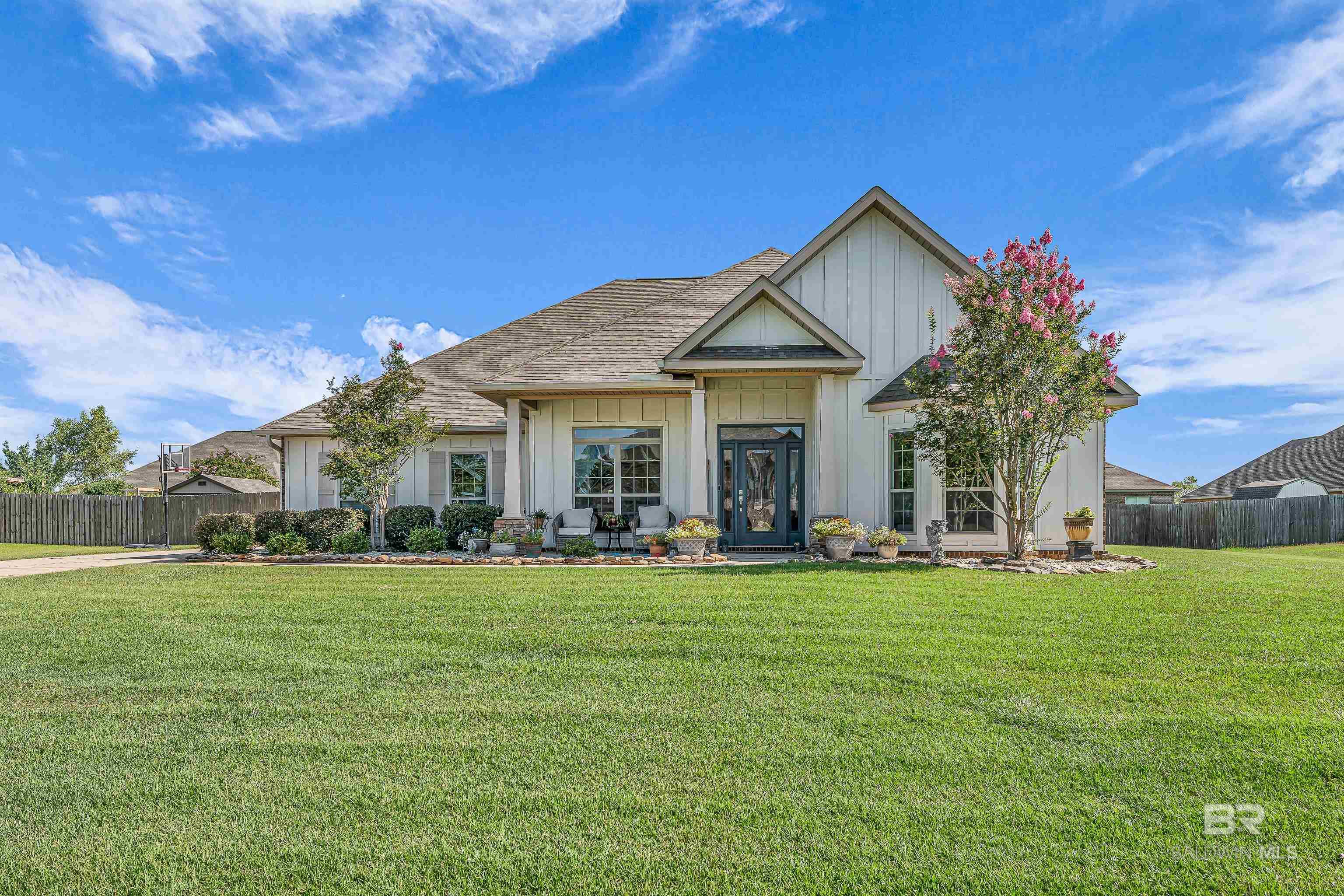 This home will have you wanting to see more from the time you walk in the front door with formal dining room and beautiful sitting room.  The hall leads you to the open living space and double sided fireplace and sunroom overlooking the outdoor oasis. Enjoy the outdoors year round with heated gunite pool, gas firepit, hot tub and mounted tv and pergola area.  You will be giving kitchen envy to friends and family with counter and cabinet space that is every baker's dream.  You don't want to miss out on this home with lighting, crown molding and flooring upgrades throughout so make your appointment to see it for yourself.   Buyer to verify all information during due diligence. Seller is Licensed Alabama Realtor.