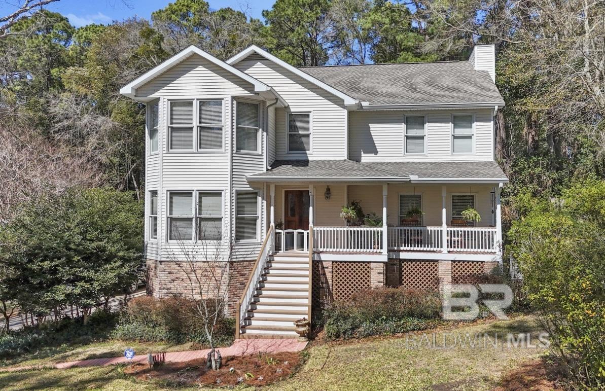Prime Olde Towne Daphne Location! This gorgeous 4BR, 3.5BA home with a Fortified Roof is just steps from downtown shops, restaurants, Mobile, Bay, schools, tennis/pickleball courts and the lively parade route! Enjoy year-round comfort in the glass-enclosed heated/cooled porch overlooking a sparkling pool- perfect for seamless indoor-outdoor living. The lush yard is a private retreat with satsuma trees and blueberry bushes for fresh fruit right at home! Opportunities in this highly sought-after location are rare- don't wait!! Schedule a showing today!!Buyer to verify all information during due diligence. Agent Buyer to verify all information during due diligence.