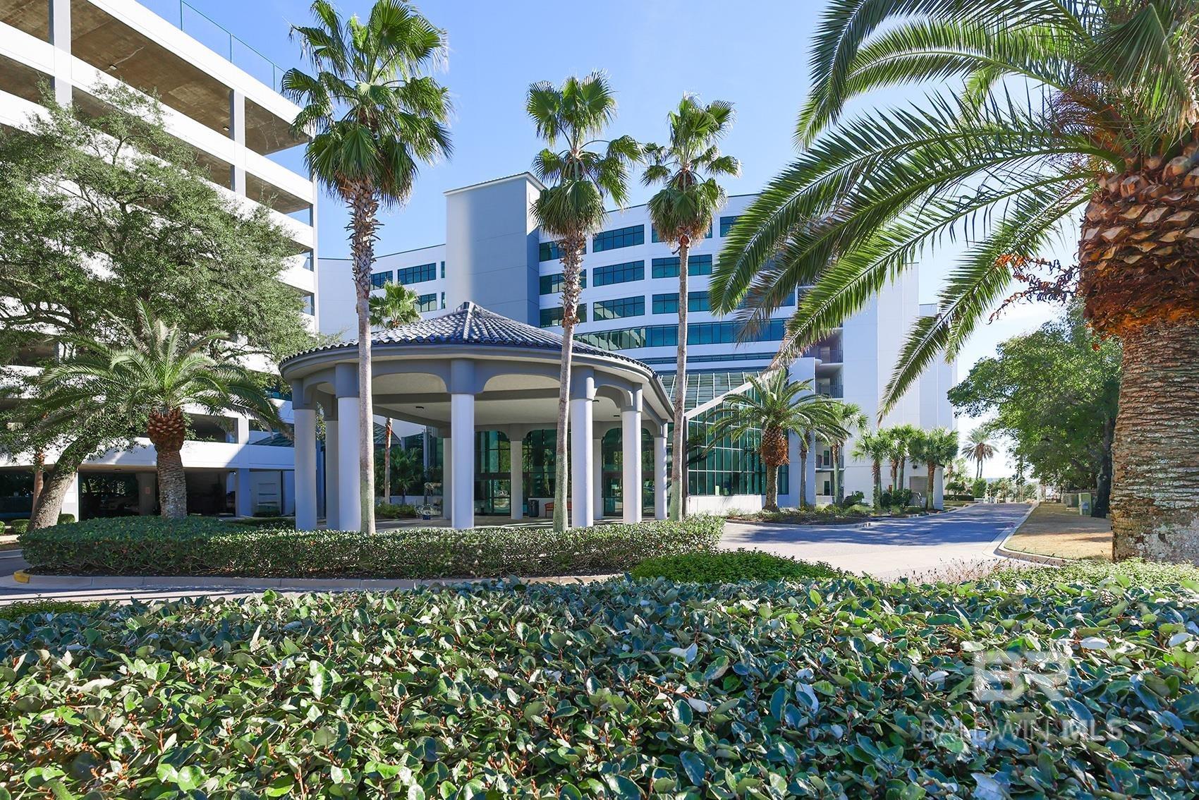 Sit on the balcony of this luxury condo & enjoy the view of Terry Cove & Perdido Pass. Niclely decorated 3 bedrooms & 3.5 baths with tile throughout, high ceilings, white cabinets & corian countertops. Wet bar has sink & wine chiller. This condo has deeded boat slip S16 inside the harbor to convey with boat house storage! Boat slip fees are $69/mo. The complex amenities include a lazy river, indoor pool/outdoor pool, lighted tennis courts, hot tubs, sauna & fitness room. Covered parking garage on each level. P-I-P solid concrete exterior with solid concrete petition walls between each unit. Come see the view! Buyer to verify all information during due diligence.