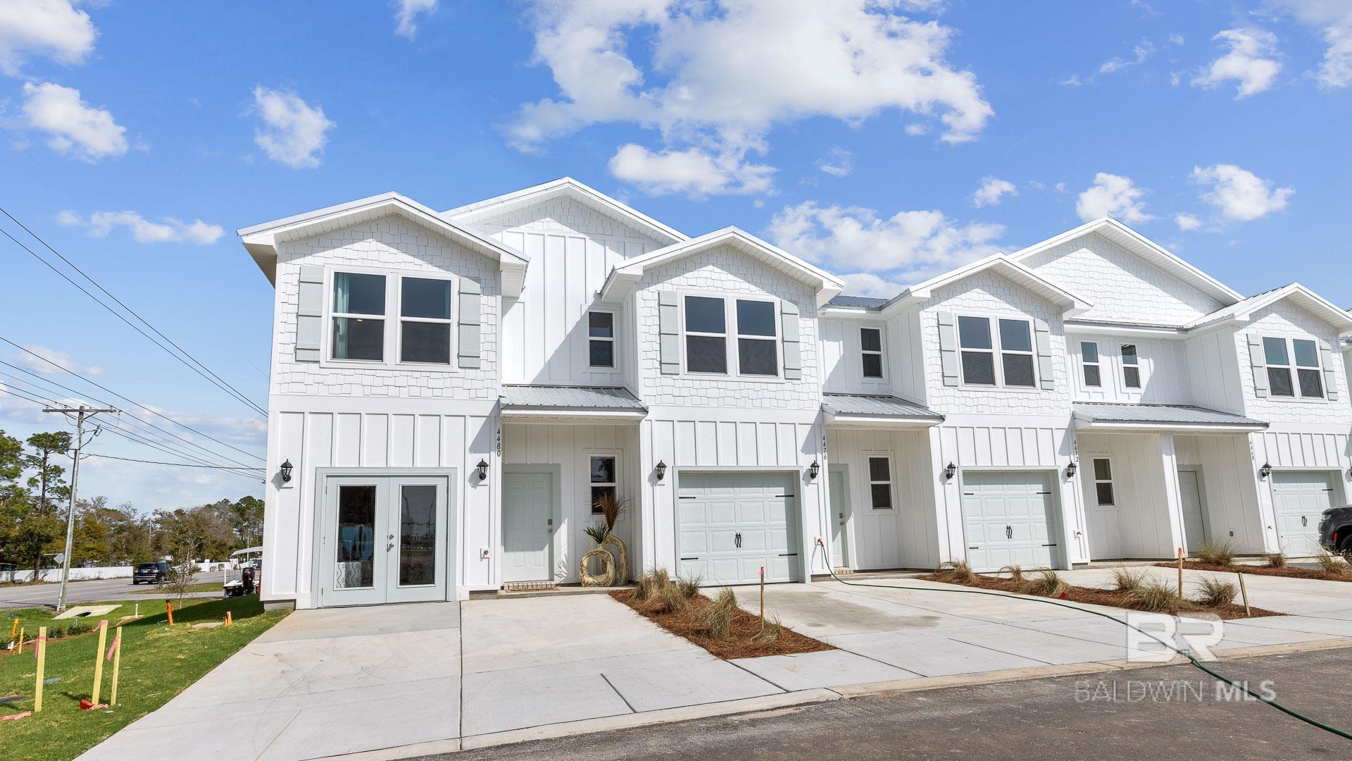 Welcome to the Palm, our brand-new townhome in the brand-new community of Lost Bay in Orange Beach, Alabama! Come see us now in this fantastic location! This gorgeous townhome has so much to offer featuring open spaces and a wonderful layout. This home is 2 stories with 1,437 square feet, 3 bedrooms, 2.5 bathrooms and a 1-car garage. Step into the Palm where you will be greeted with an entryway into the modern, open concept with gorgeous features. The stairway will be to one side opposite of the garage. You will then pass the convenient hallway bathroom across from the beautiful kitchen which seamlessly blends into the dining and living room. The living room also flows into the back patio, making an ideal place for entertaining or unwinding. The bedrooms are located upstairs with the primary first and the additional two bedrooms in the back of the home. The beautiful primary bedroom with large windows and a walk-in closet boasts an ensuite with a double-bowl vanity, bathtub and walk in shower and even includes extra space with shelving. The laundry room is also upstairs offering great convenience. All of the rooms include windows and closet space as well. This Palm townhome is a part of the wonderful new home community in Orange Beach, Alabama. Here you will enjoy peace and quiet along with the convenience of being just minutes to the white sand beaches, local schools and an abundance of shopping and dining and the Beach Express offering a quick commute. Schedule your tour to find your new home at Franklin Place at Independence today! Pictures are of similar home and not necessarily of subject property, including interior and exterior colors, options, and finishes. Buyer to verify all information during due diligence. *HOA dues will cover water, sewer, lawn maintenance, irrigation for backyard and common spaces, trash, yearly termite bond, streetlights, management, & reserve funding per lot (road, roof, & fence replacement). Estimated completion of November 2025!