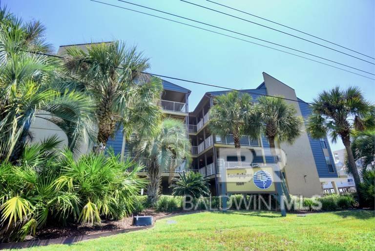 Discover the charm of coastal living in this beautifully updated 2BR/2BA condo at Sandpiper, a beloved low-density Gulf Shores community just steps from the beach. This inviting unit is fully furnished, rental-ready, and packed with comfort featuring a queen in the primary bedroom, two full beds in the guest room, and a sleeper sofa to accommodate up to six guests. Inside, enjoy a bright, renovated interior, 3 flat-screen TVs, high-speed WiFi, a fully equipped kitchen, and the convenience of an in-unit washer and dryer. While the condo itself does not offer Gulf views, the complex sits directly on the beach, and a short walk down the communal balcony leads you to beautiful views of the landscaped pool and shimmering Gulf waters. Sandpiper’s unique V-shaped design creates a friendly, classic beach-town feel. Owners and guests enjoy covered parking, BBQ grills, an elevator, and a seasonally heated outdoor pool (mid-March through October, as needed). With its unbeatable location, you're minutes from Gulf Shores’ best dining, shopping, and recreation. Whether you're seeking a relaxing getaway or a strong income-producing property, this unit offers excellent potential in one of the most charming complexes on the Alabama Gulf Coast. Property is sold AS IS, WHERE IS, and subject to all Alabama Right of Redemption laws. Buyer to verify all information during due diligence.