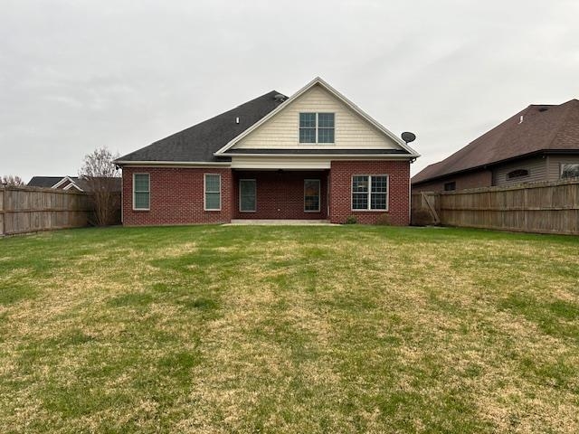 Check out the back yard in this patio home.  Lots of room for entertaining or playing!