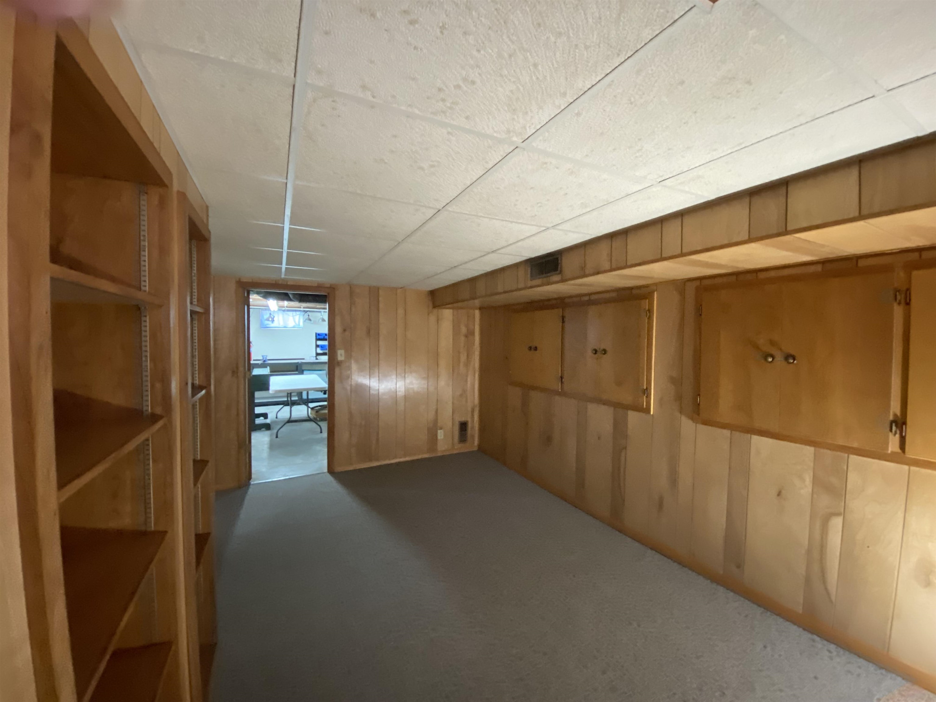 Offers built in shelves and storage into crawl space